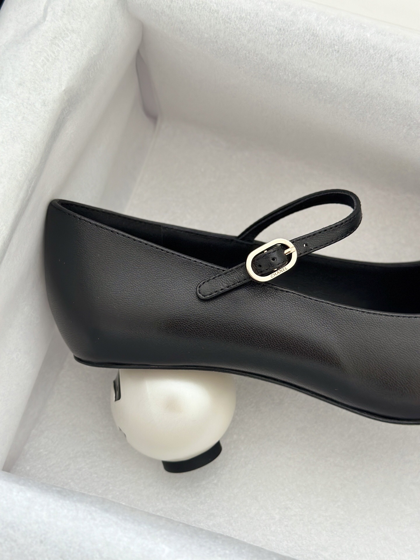 Pair of black Chanel Mary Jane pumps with a white pearl heel and patent leather toe cap in a brand box - Hình 9