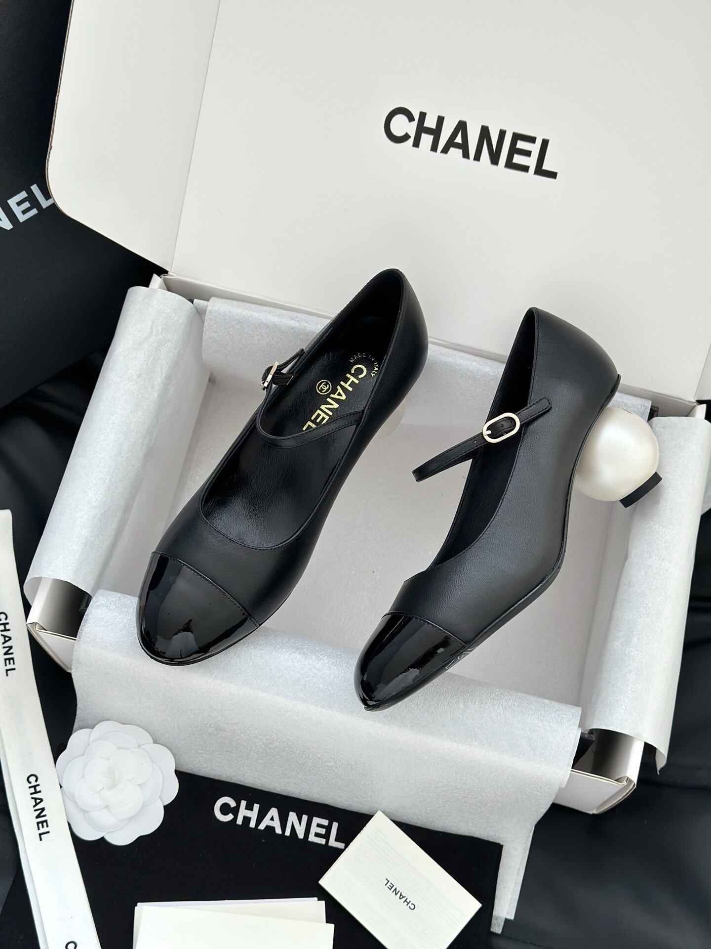 Pair of black Chanel Mary Jane pumps with a white pearl heel and patent leather toe cap in a brand box - Hình 5