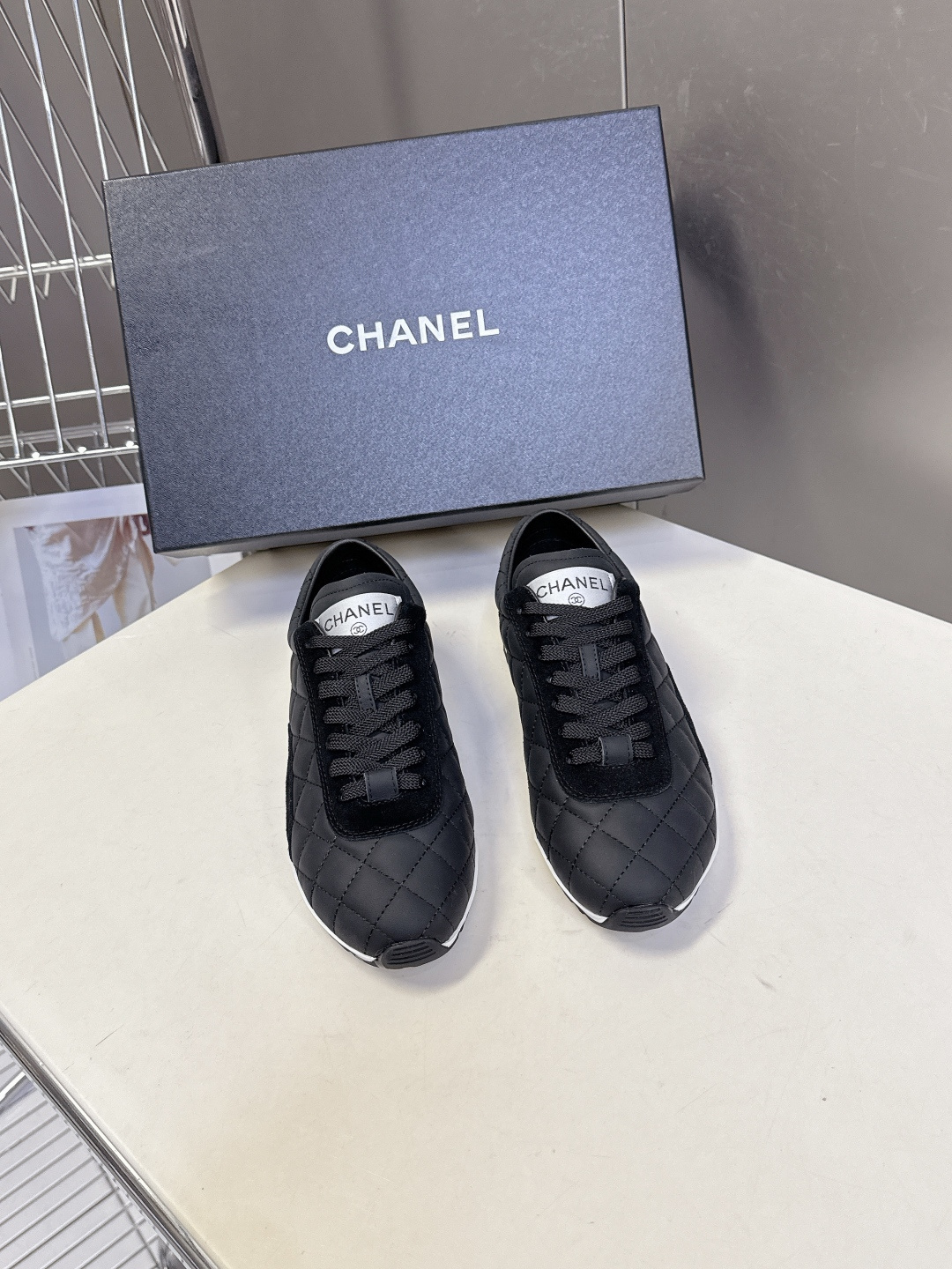 Chanel Black Quilted Sneakers with CC Logo – Luxury Women’s Shoes