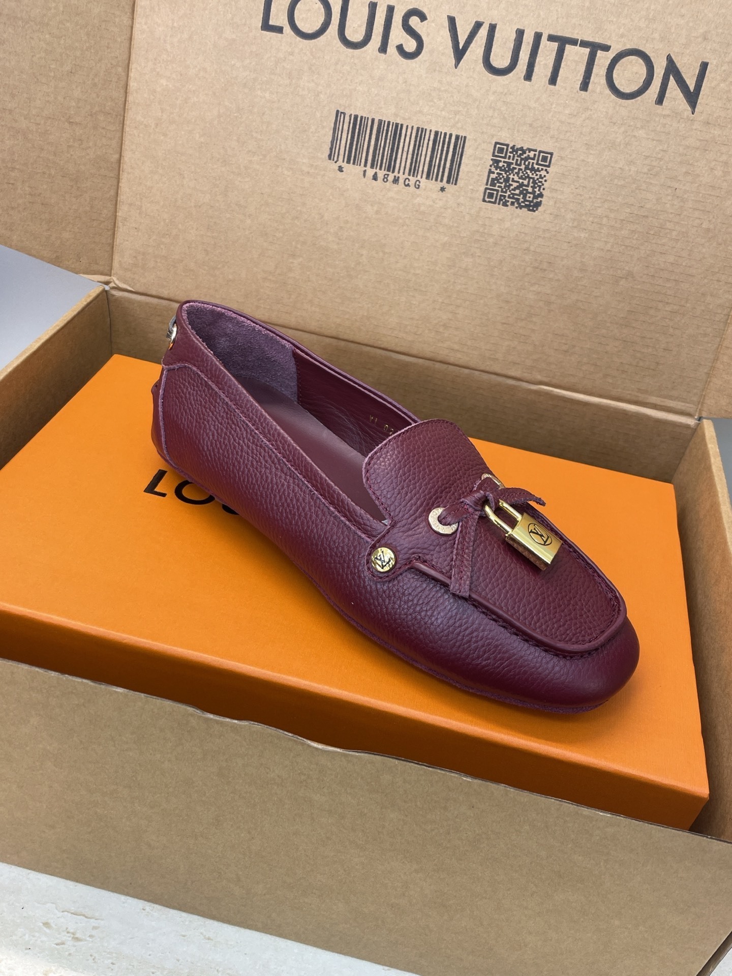 Louis Vuitton Gloria Flat Loafers in Burgundy Grained Leather