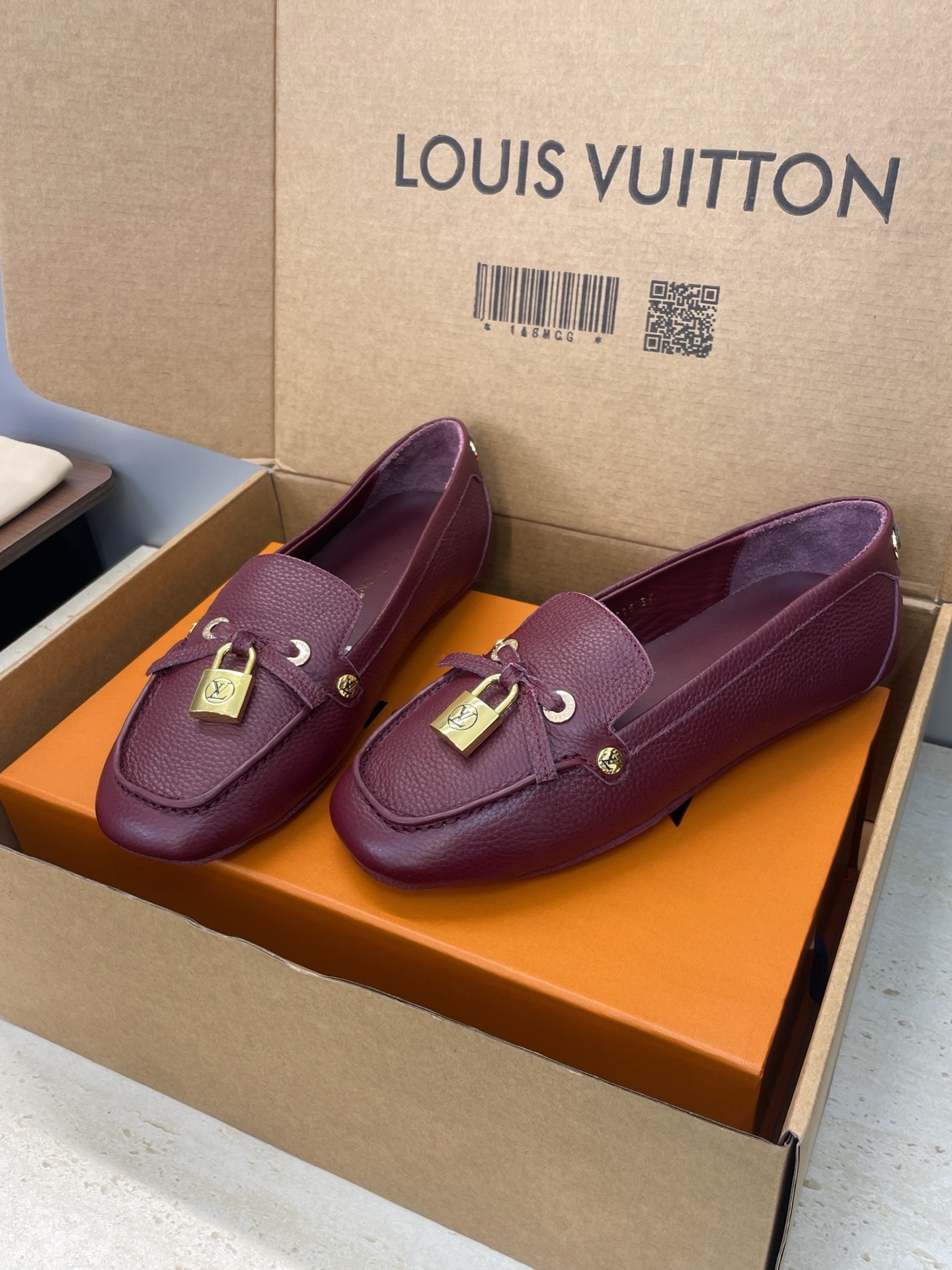 Louis Vuitton Gloria Flat Loafers in Burgundy Grained Leather