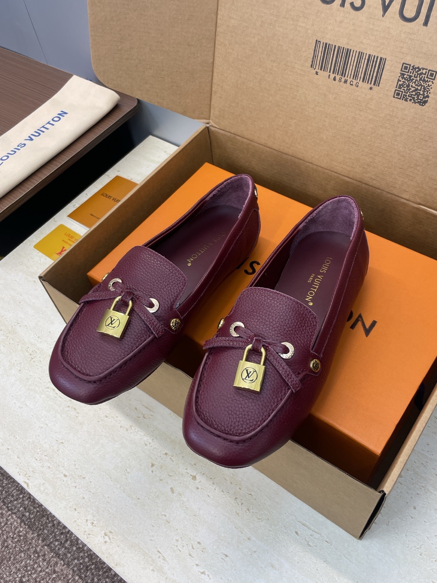 Louis Vuitton Gloria Flat Loafers in Burgundy Grained Leather