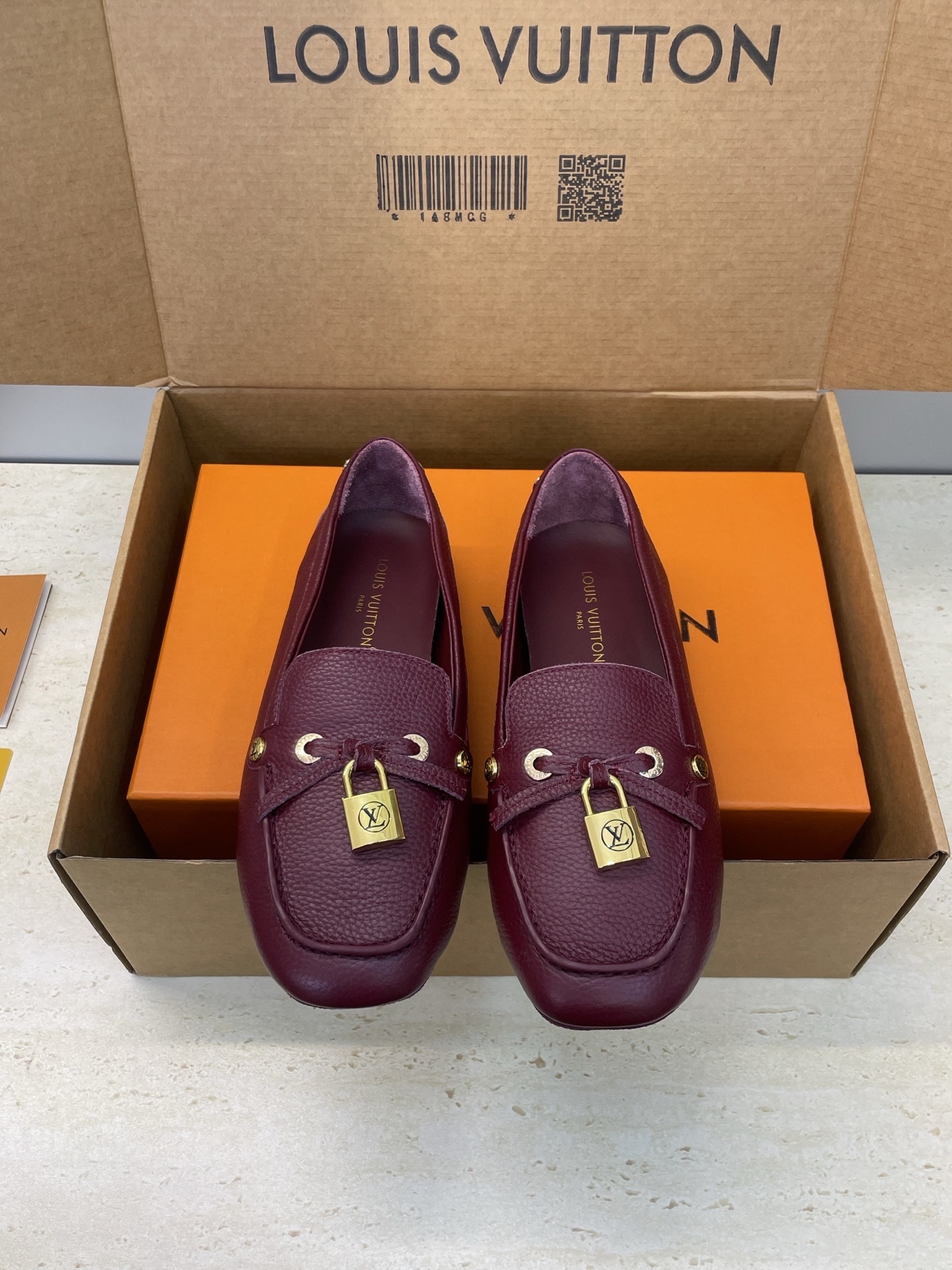 Louis Vuitton Gloria Flat Loafers in Burgundy Grained Leather