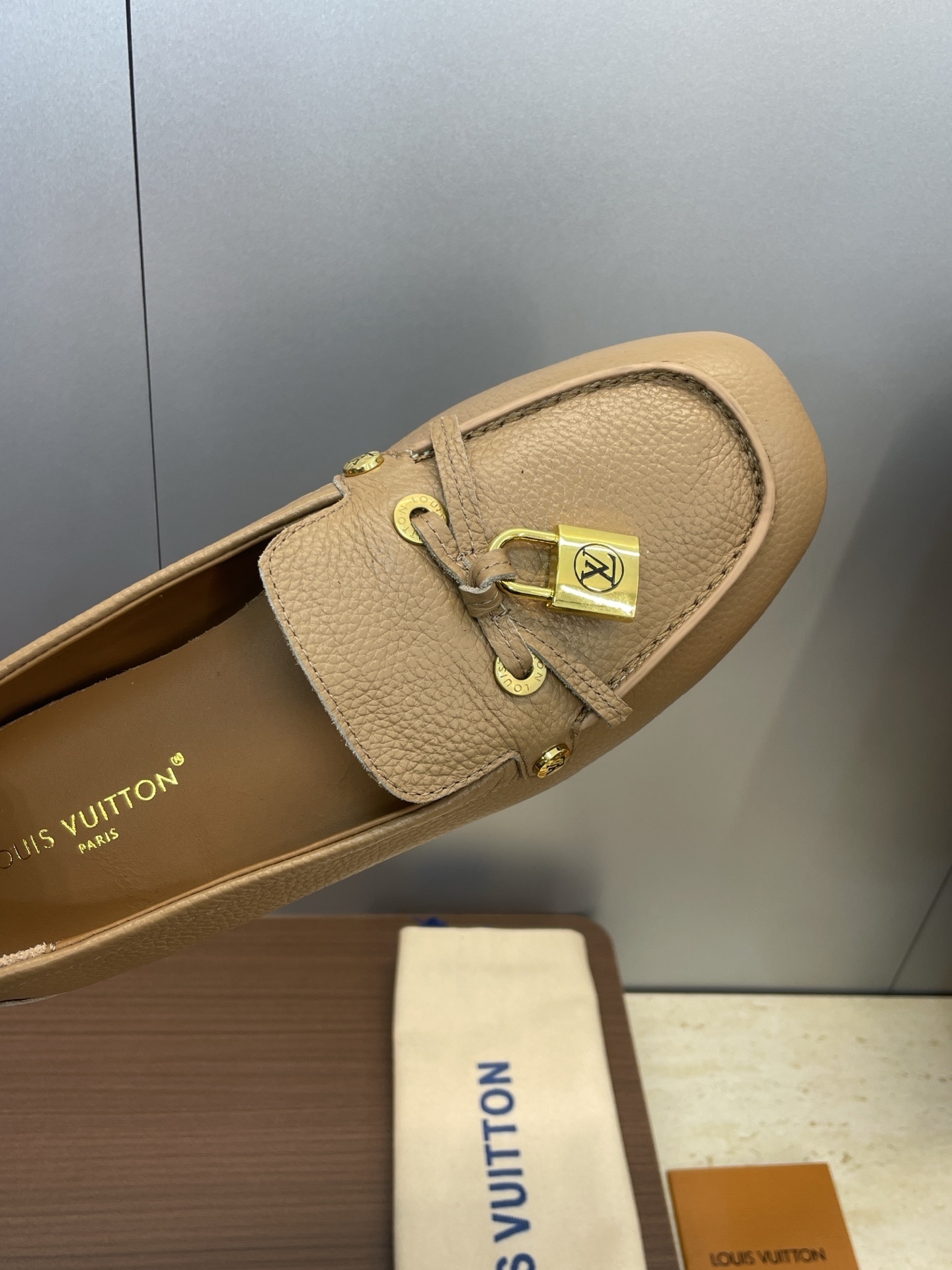 Louis Vuitton Beige Leather Loafers with Gold Padlock Detail