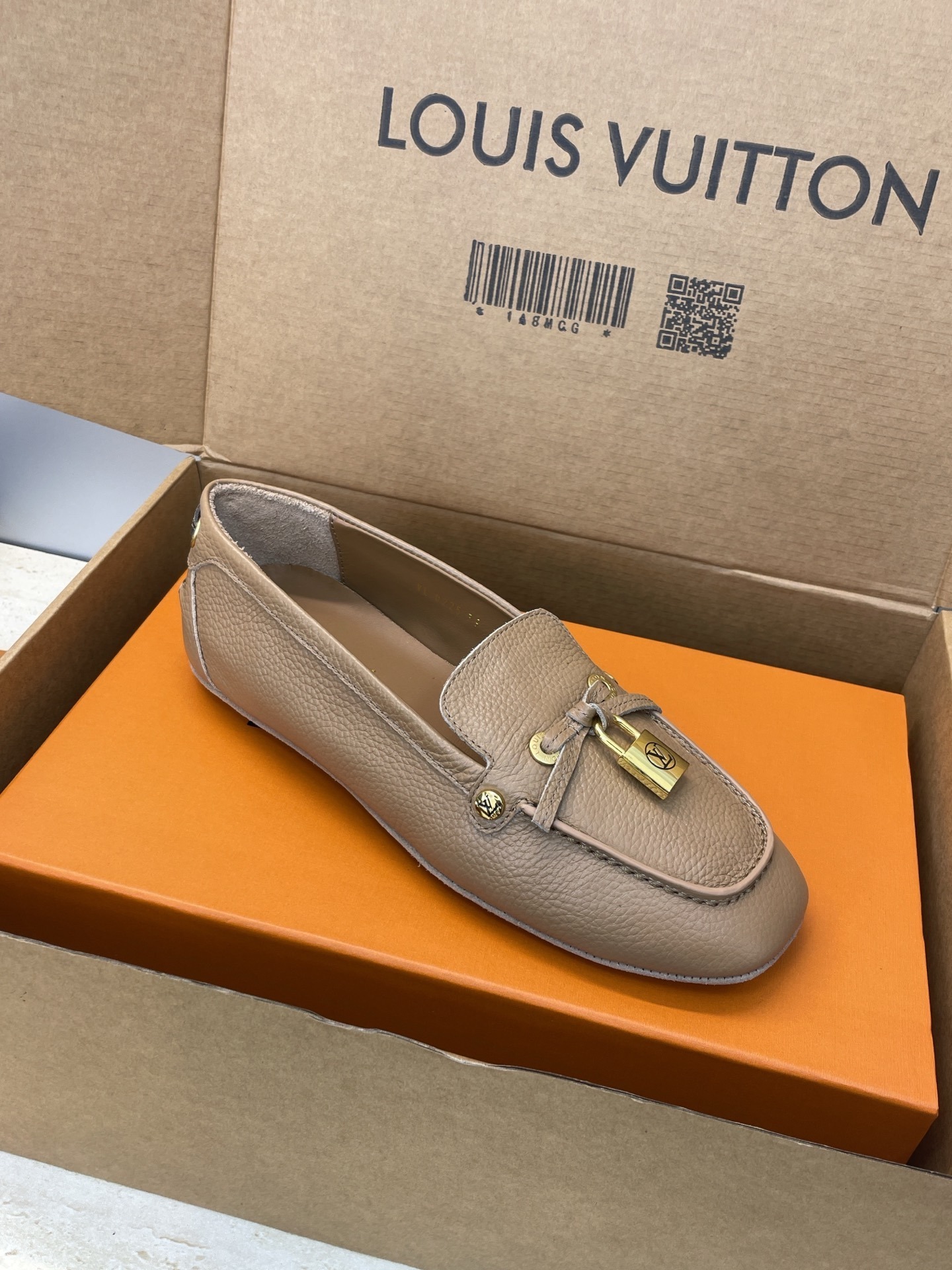 Louis Vuitton Beige Leather Loafers with Gold Padlock Detail