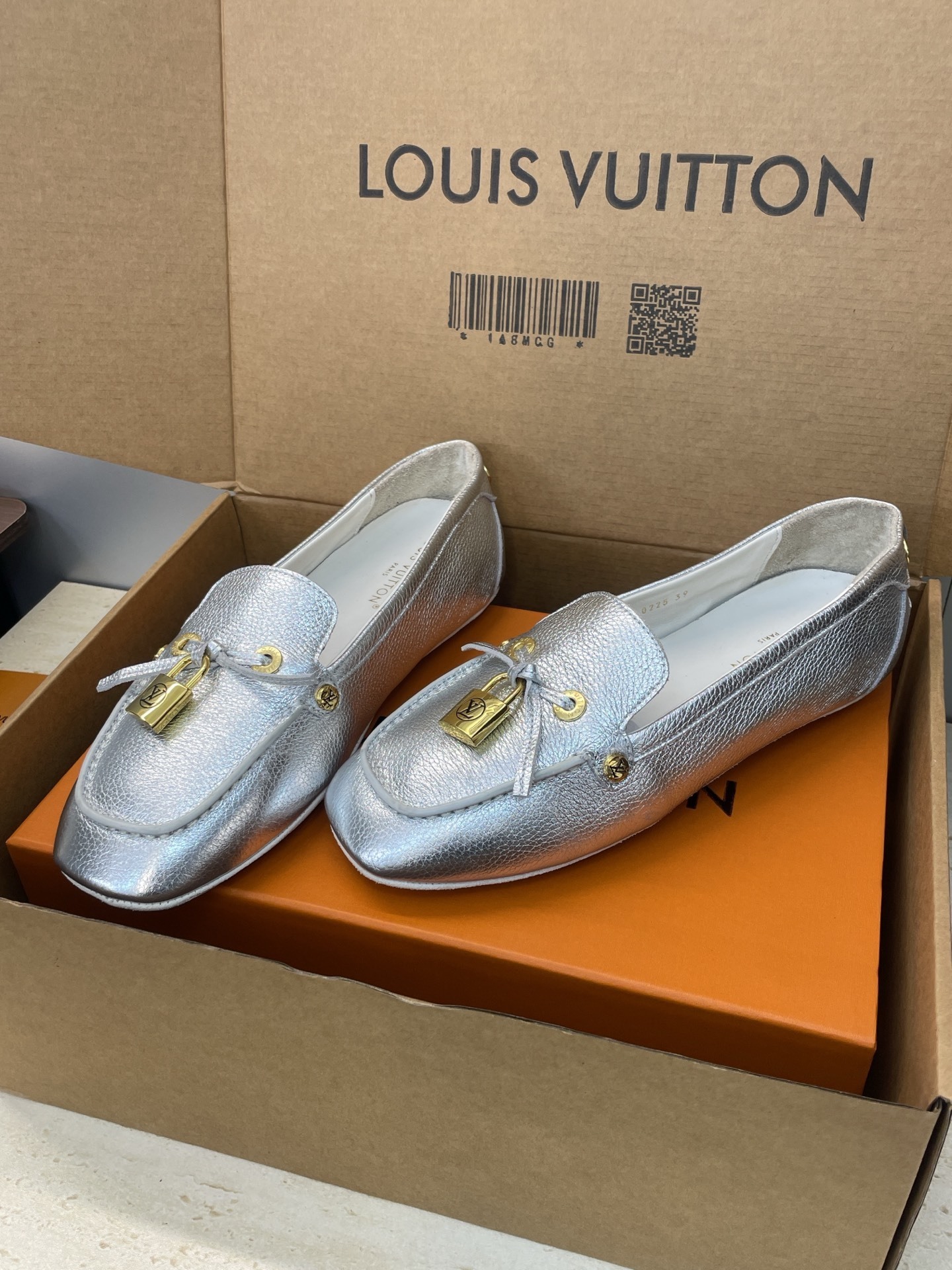 Louis Vuitton Silver Metallic Leather Loafers with LV Padlock