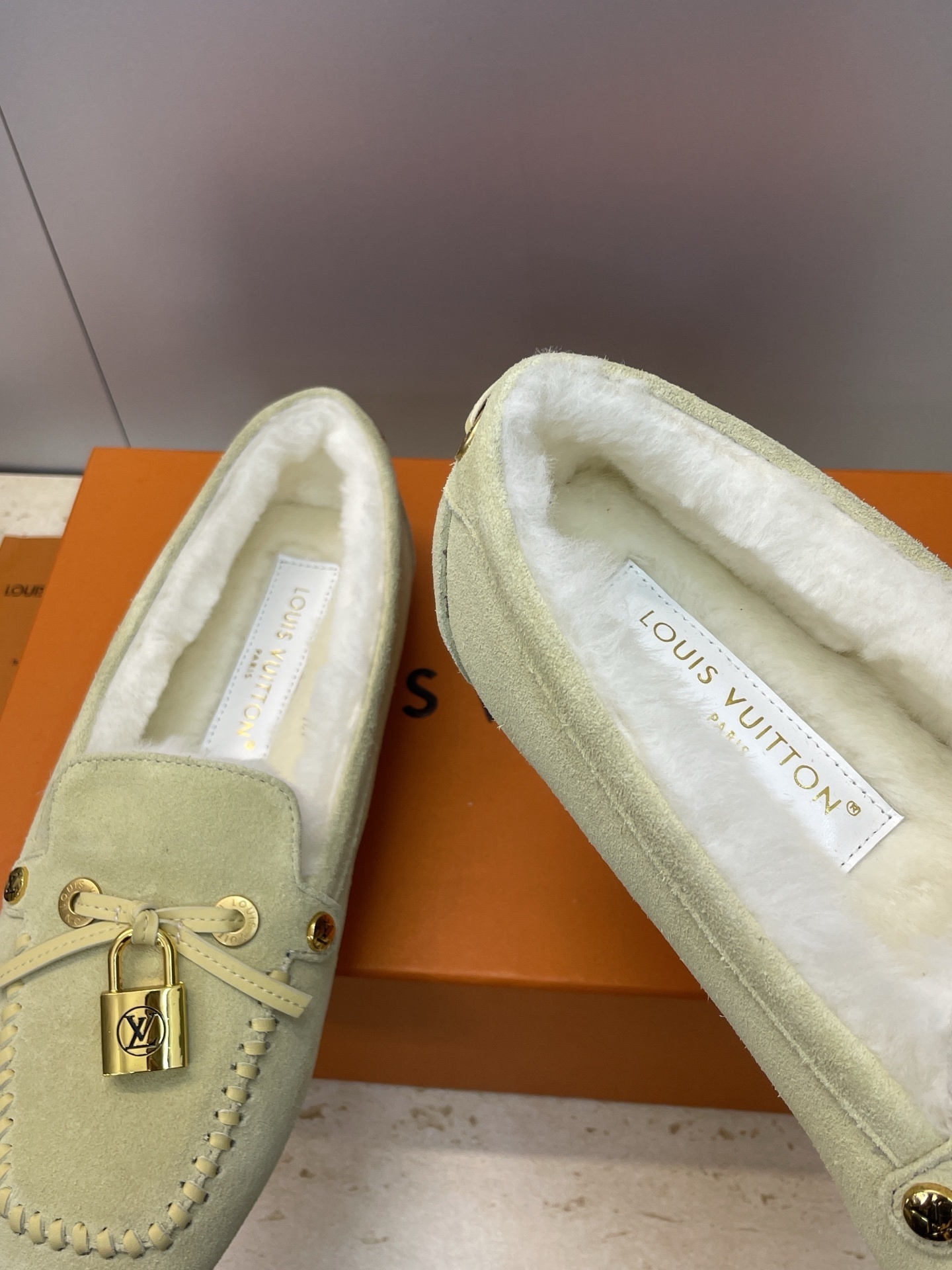 Louis Vuitton Suede Moccasins with Shearling Lining and LV Padlock