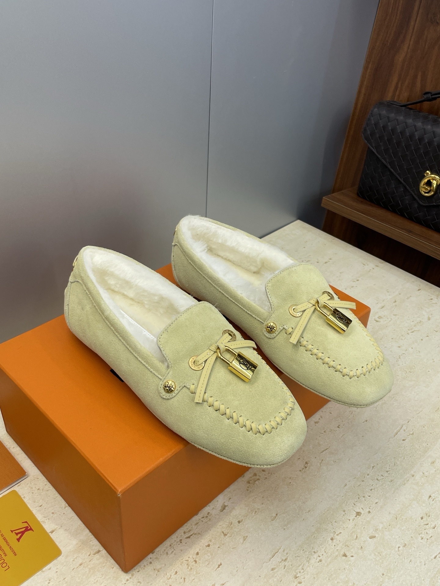 Louis Vuitton Suede Moccasins with Shearling Lining and LV Padlock