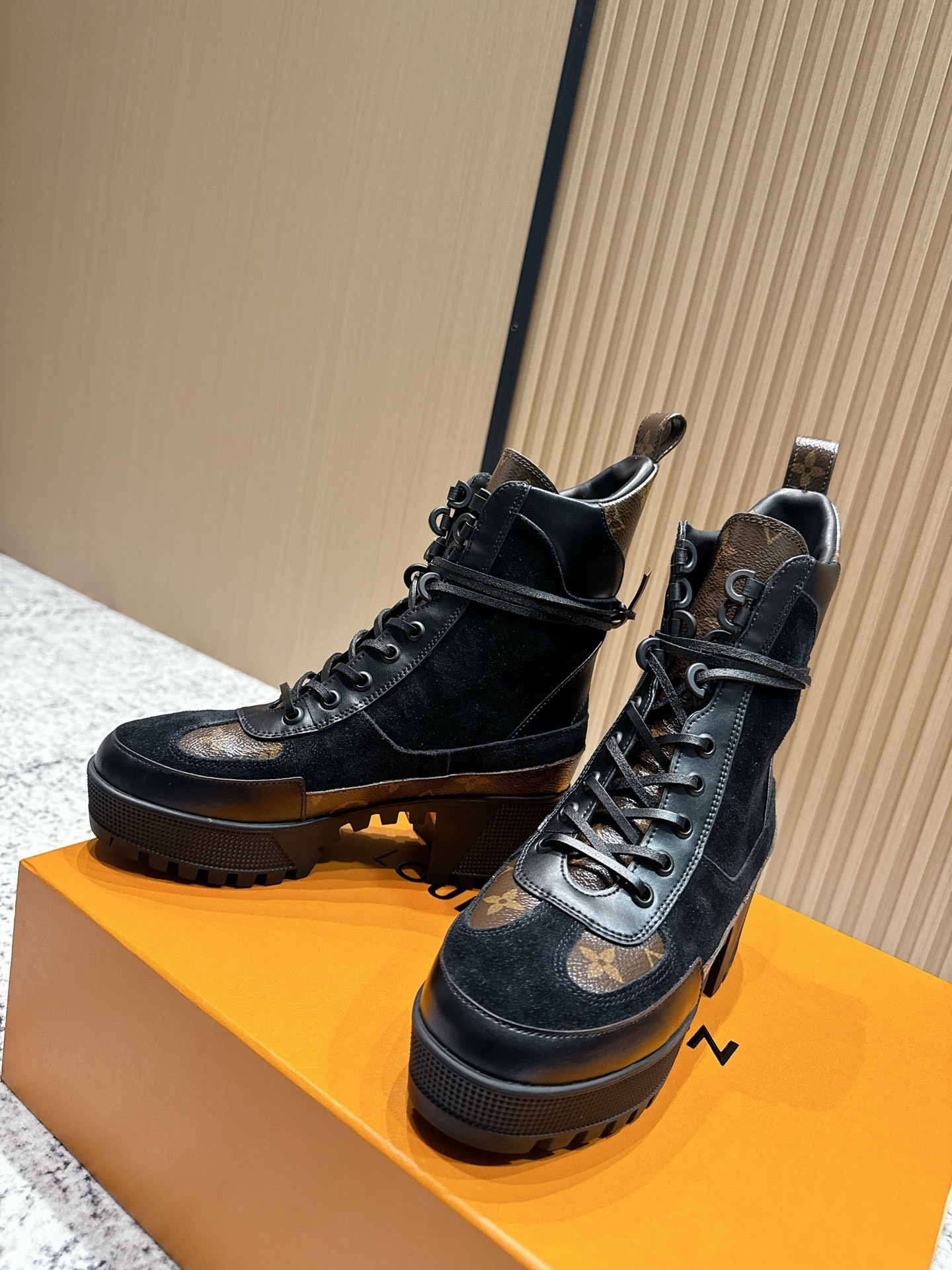 Louis Vuitton Monogram Leather & Suede Lace-Up Platform Boots