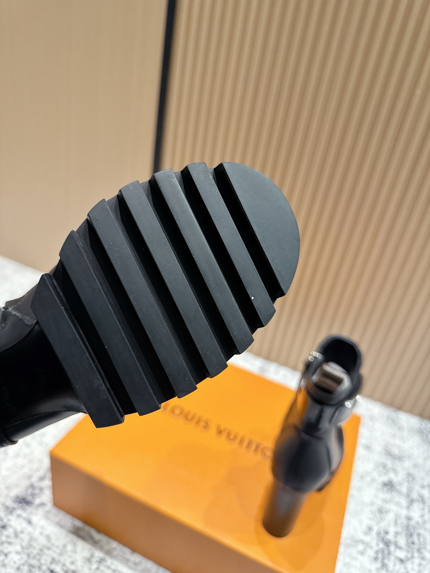 Luxury Black Leather Ankle Boots with Buckle and Monogram Tab