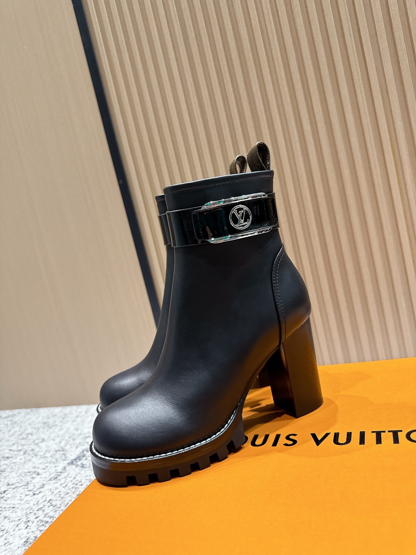 Luxury Black Leather Ankle Boots with Buckle and Monogram Tab