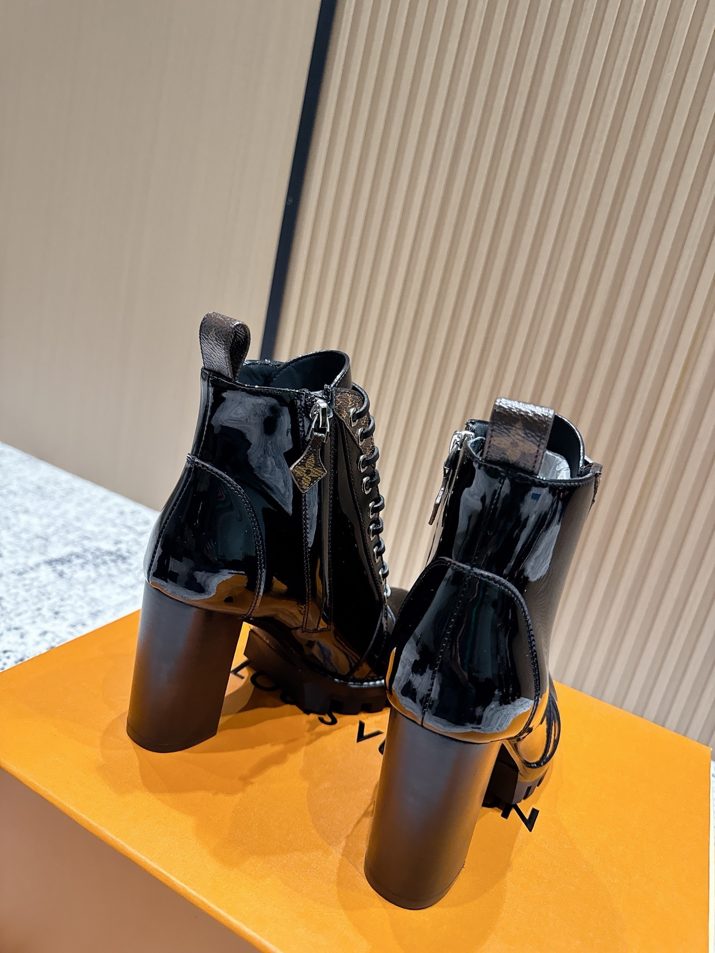 Luxury Black Patent Leather Lace-Up Ankle Boots with Monogram Trim