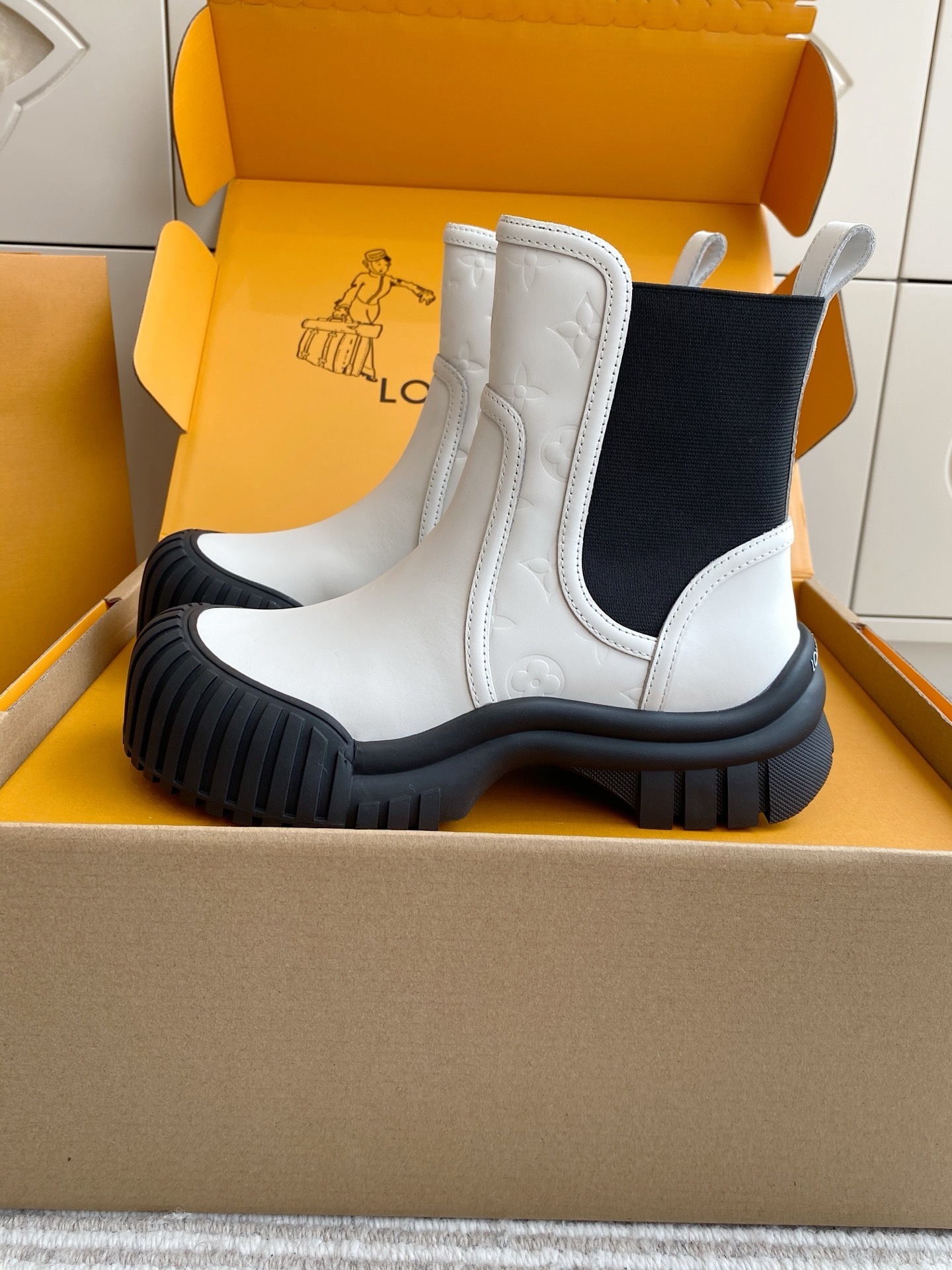 Louis Vuitton White Leather Ankle Boots with Chunky Ribbed Sole