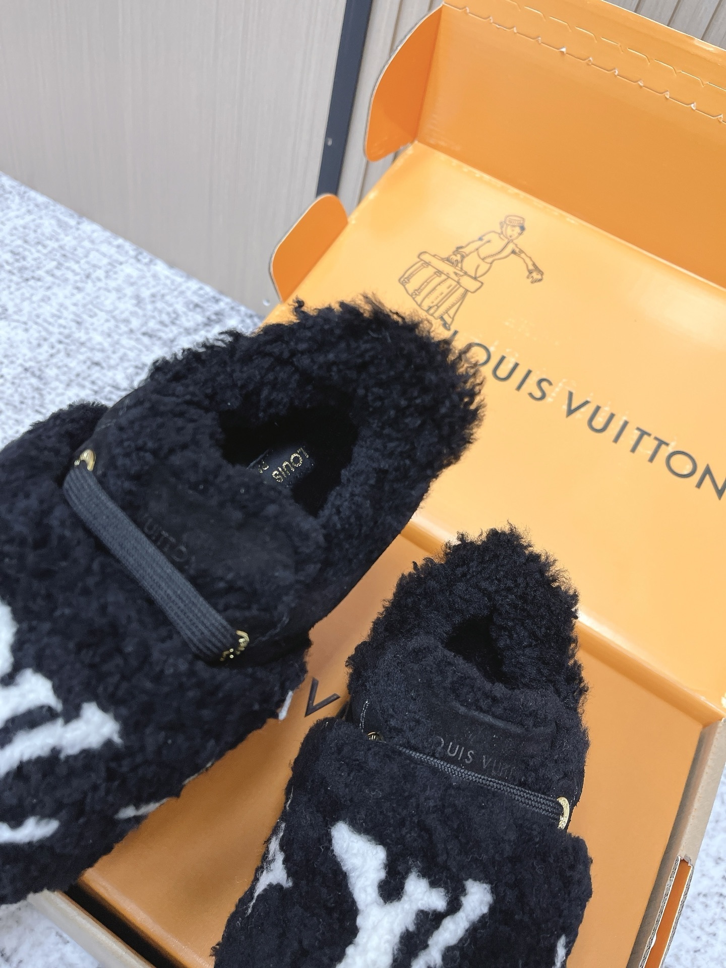 Louis Vuitton Black Shearling LV Logo Flat Comfort Mules