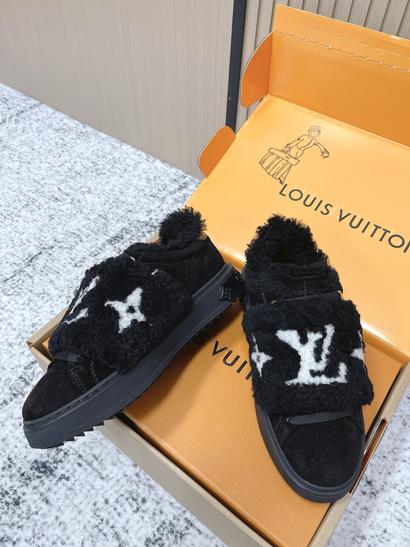 Louis Vuitton Black Shearling LV Logo Flat Comfort Mules