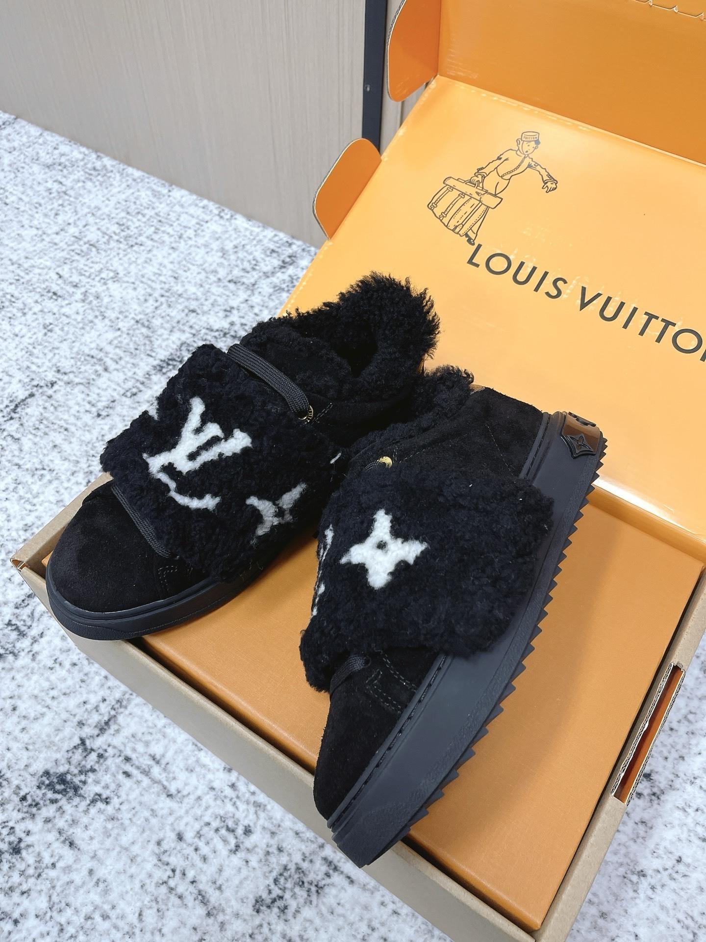 Louis Vuitton Black Shearling LV Logo Flat Comfort Mules