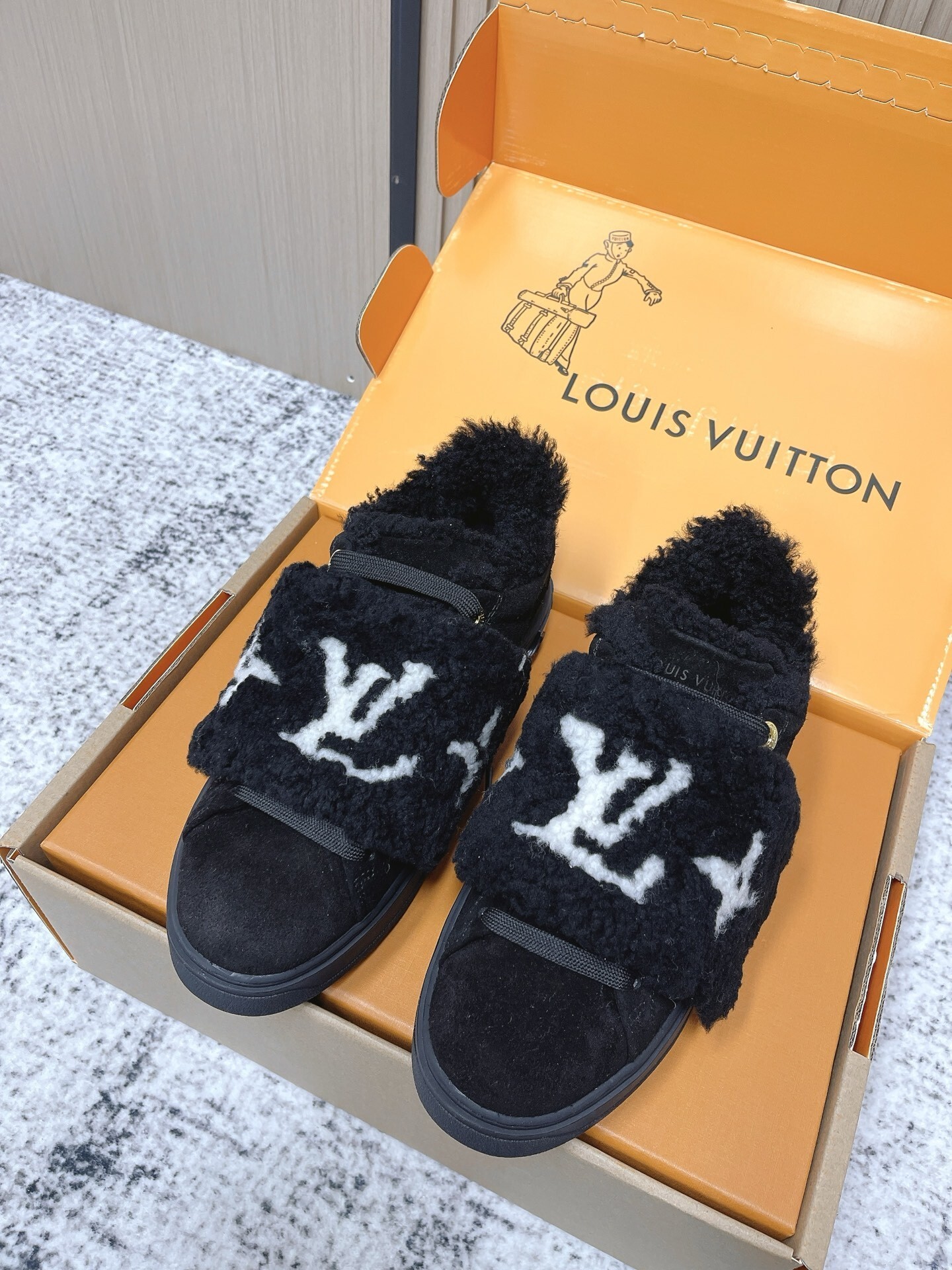 Louis Vuitton Black Shearling LV Logo Flat Comfort Mules