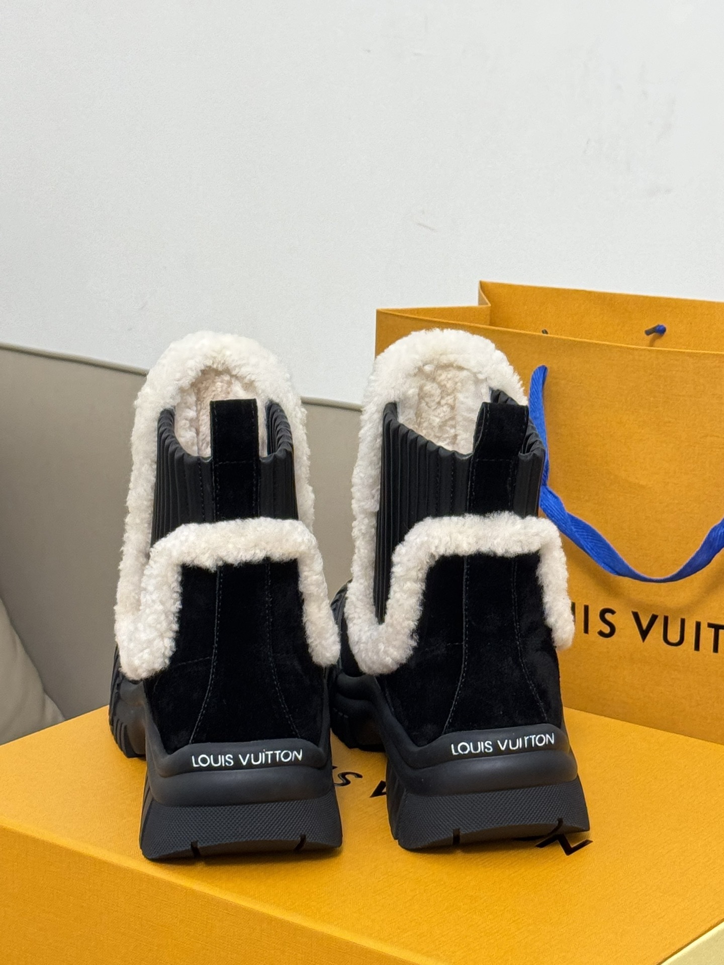 Louis Vuitton Black Suede Shearling Ankle Boots - Luxury Winter Style