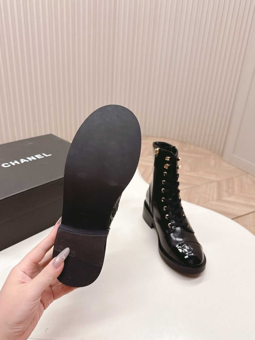 Pair of Chanel black patent leather lace-up ankle boots with embossed CC logo on toe cap and gold-tone hardware. - Hình 7