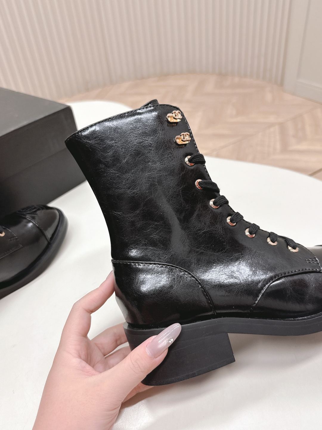 Pair of Chanel black patent leather lace-up ankle boots with embossed CC logo on toe cap and gold-tone hardware. - Hình 4