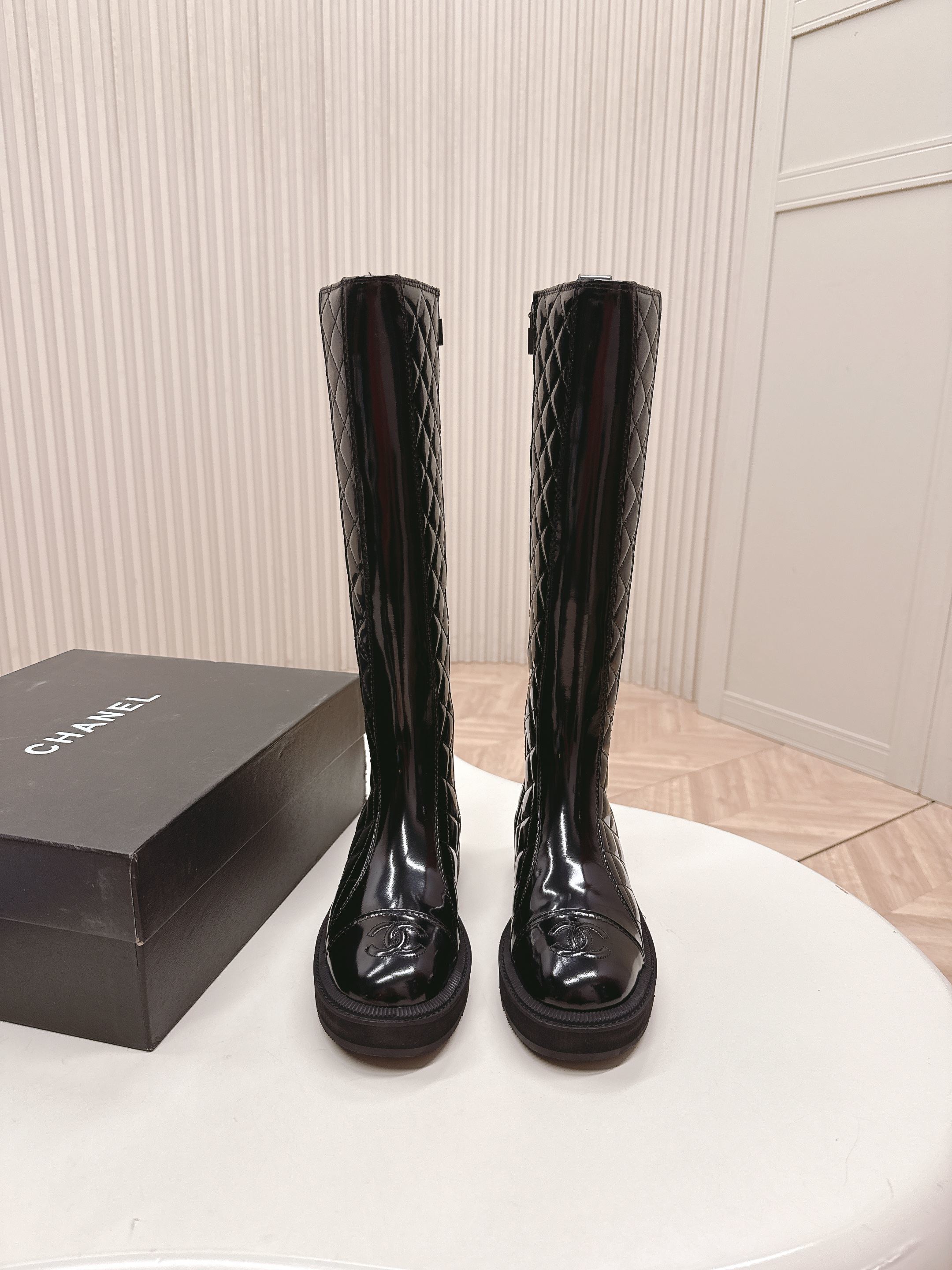 Luxury Chanel Quilted Patent Leather Knee-High Boots in Black