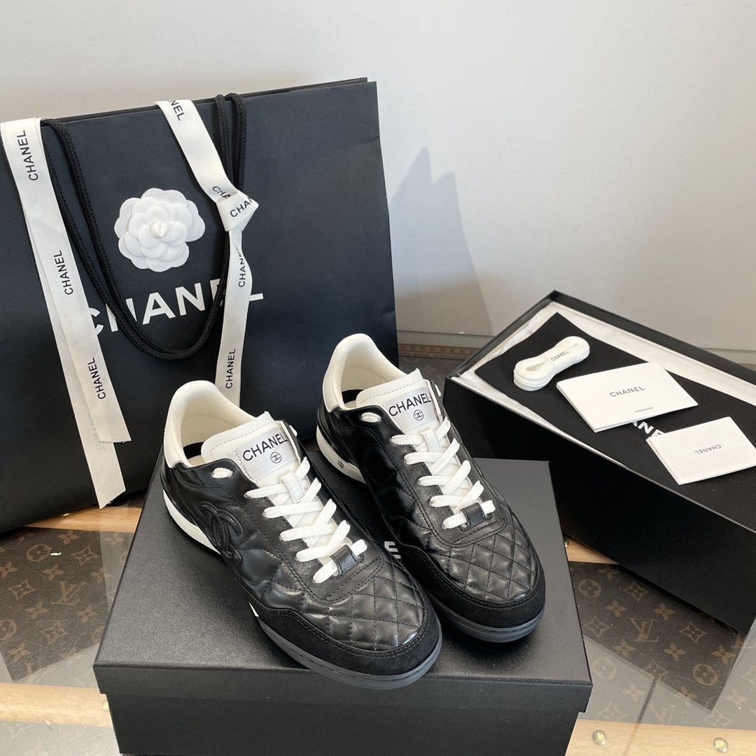 Chanel Quilted Leather Sneakers – Black & White Luxury Shoes