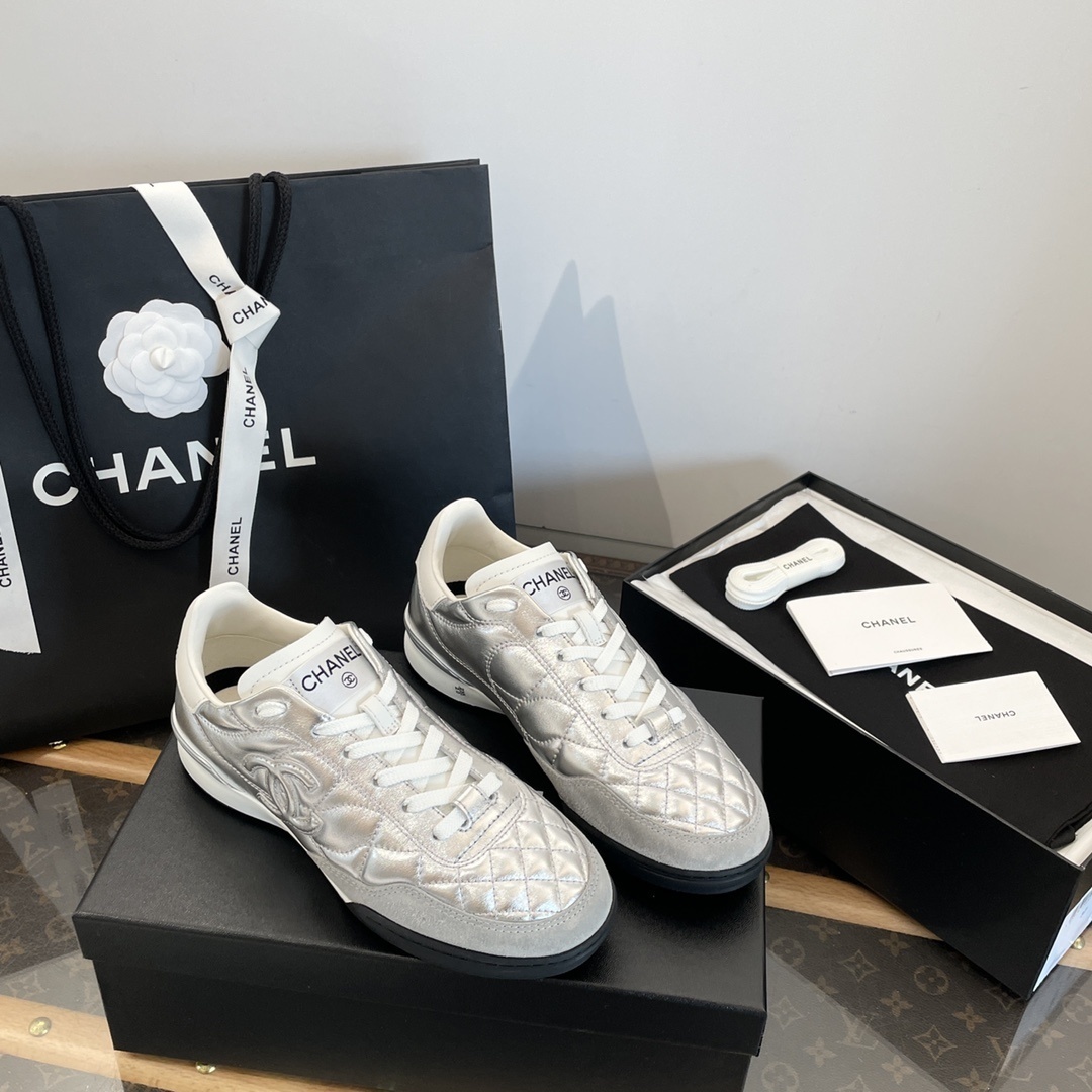 Chanel Metallic Silver Quilted Leather Low-Top Sneakers