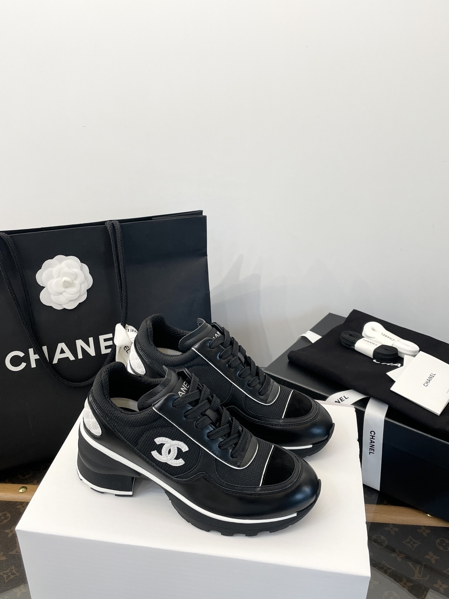 Chanel Women’s Black and White Leather Mesh Platform Sneakers