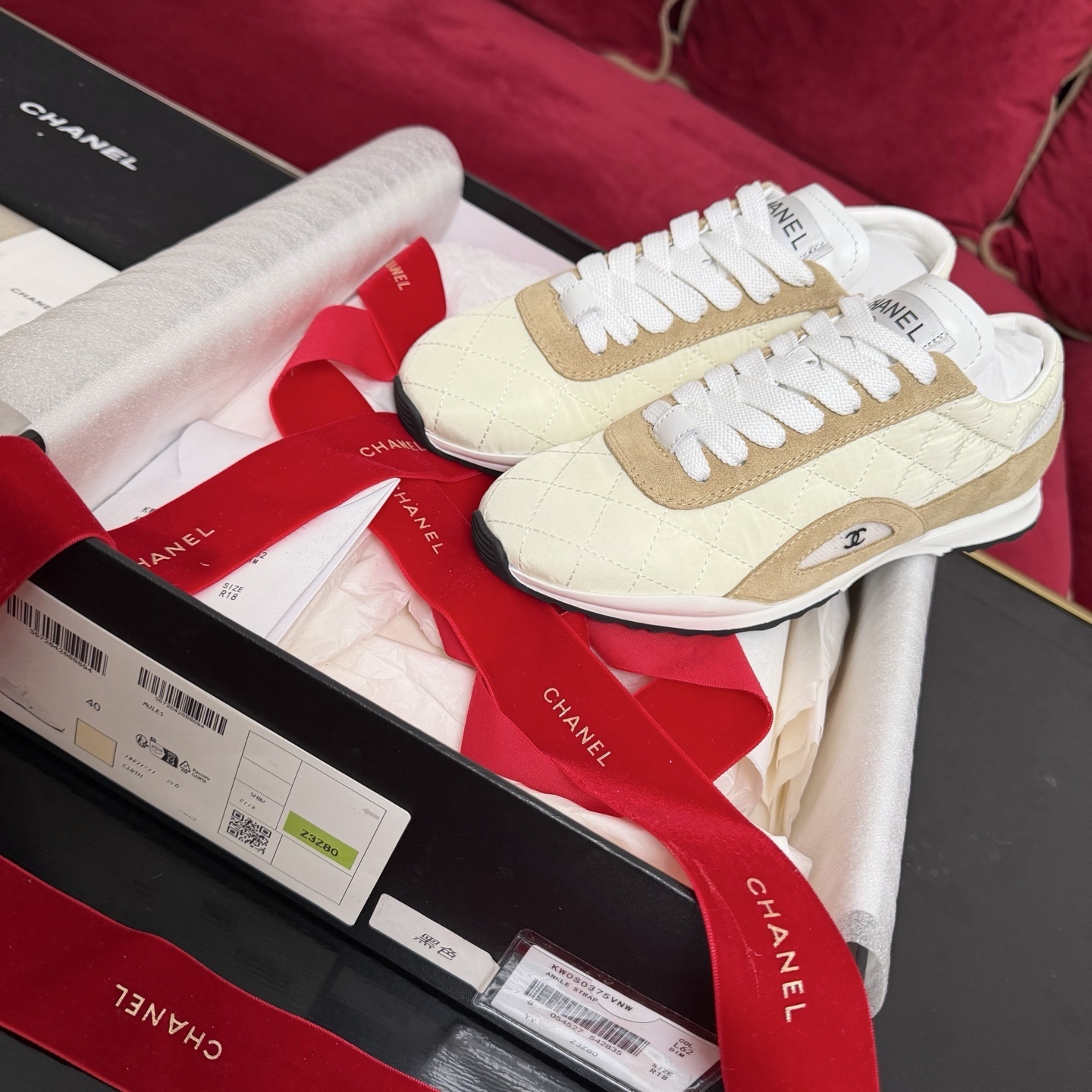 Pair of Chanel quilted fabric and suede sneakers in beige and cream color with original box and red ribbon - Hình 2