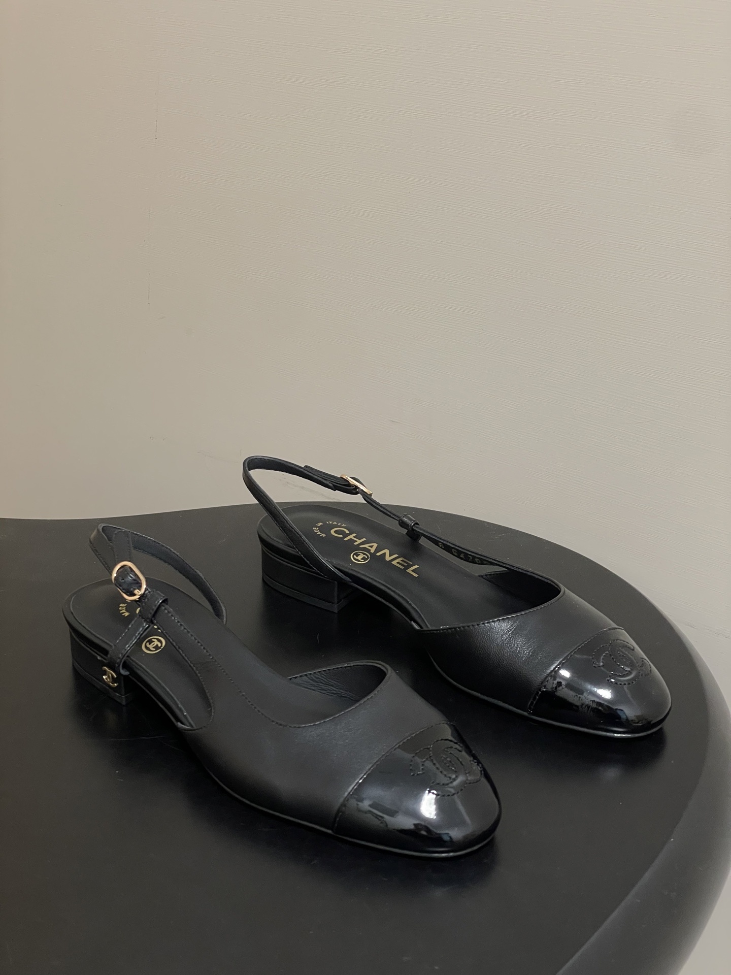 Chanel Black Leather Slingback Pumps with Patent Cap Toe