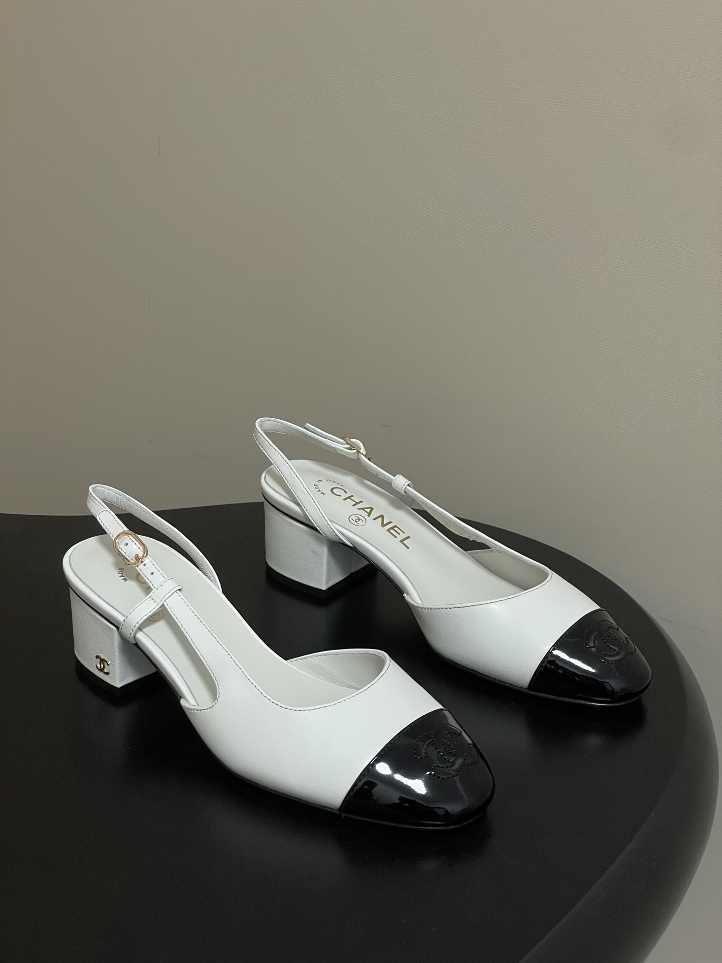 Chanel Classic Two-Tone Slingback Pumps in White and Black Leather