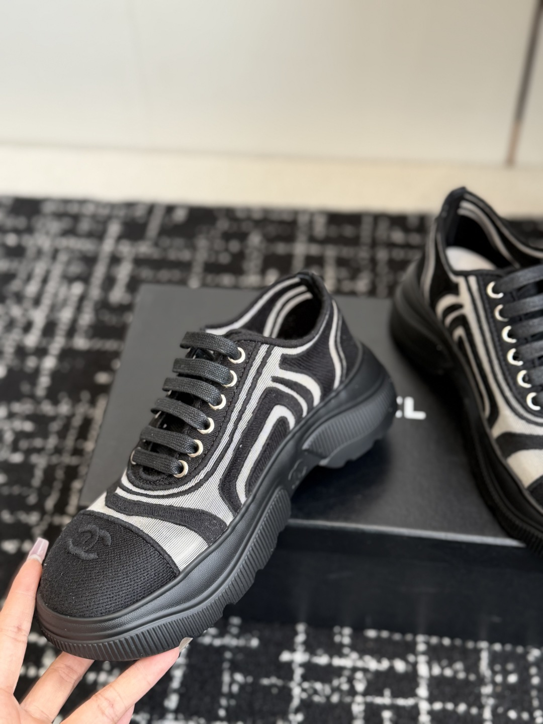 Pair of Chanel black and white mesh sneakers with chunky soles and interlocking CC logo on the toe cap. - Hình 6