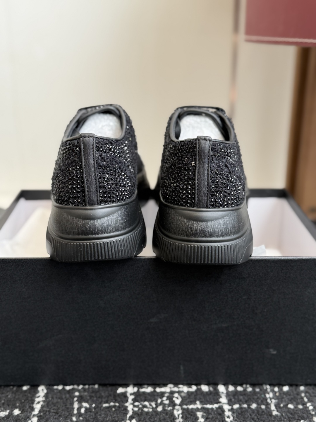 Pair of Chanel black and white sneakers covered in sparkling crystals with CC logo on the toe cap. - Hình 8