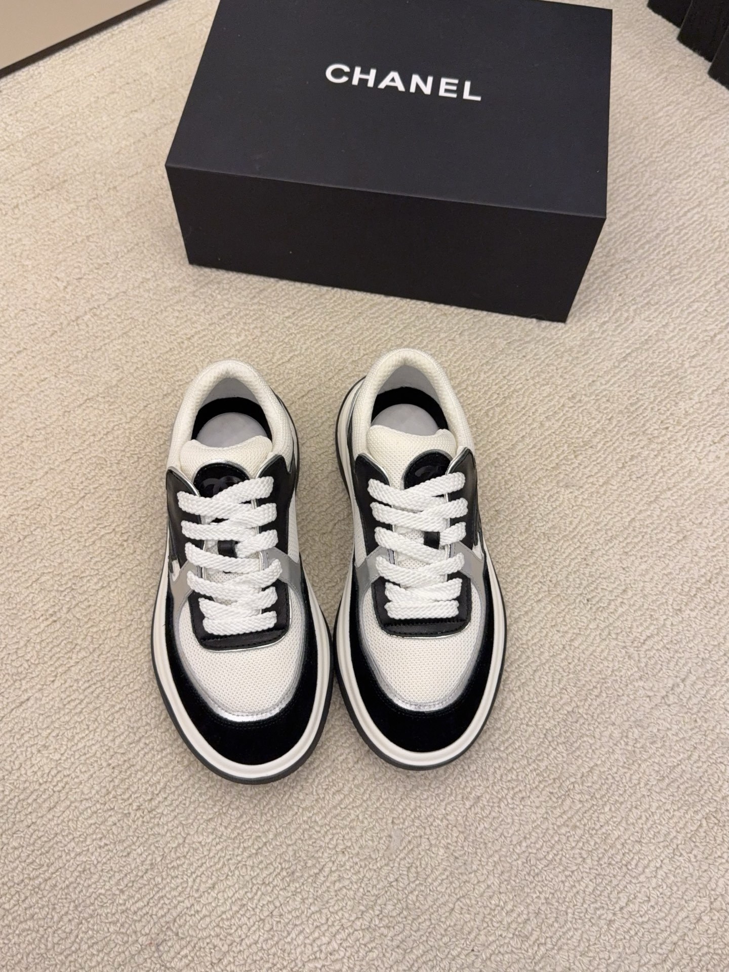 Chanel Black and White Mesh Sneakers with Silver Accents