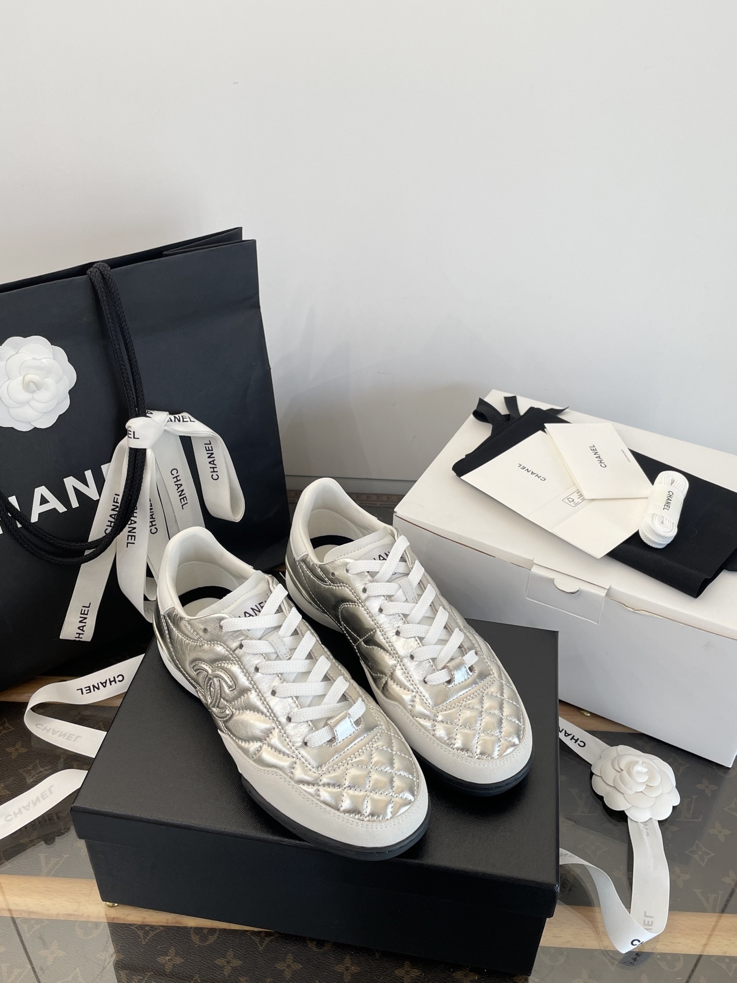 Chanel Metallic Silver Quilted Leather Sneakers with CC Logo