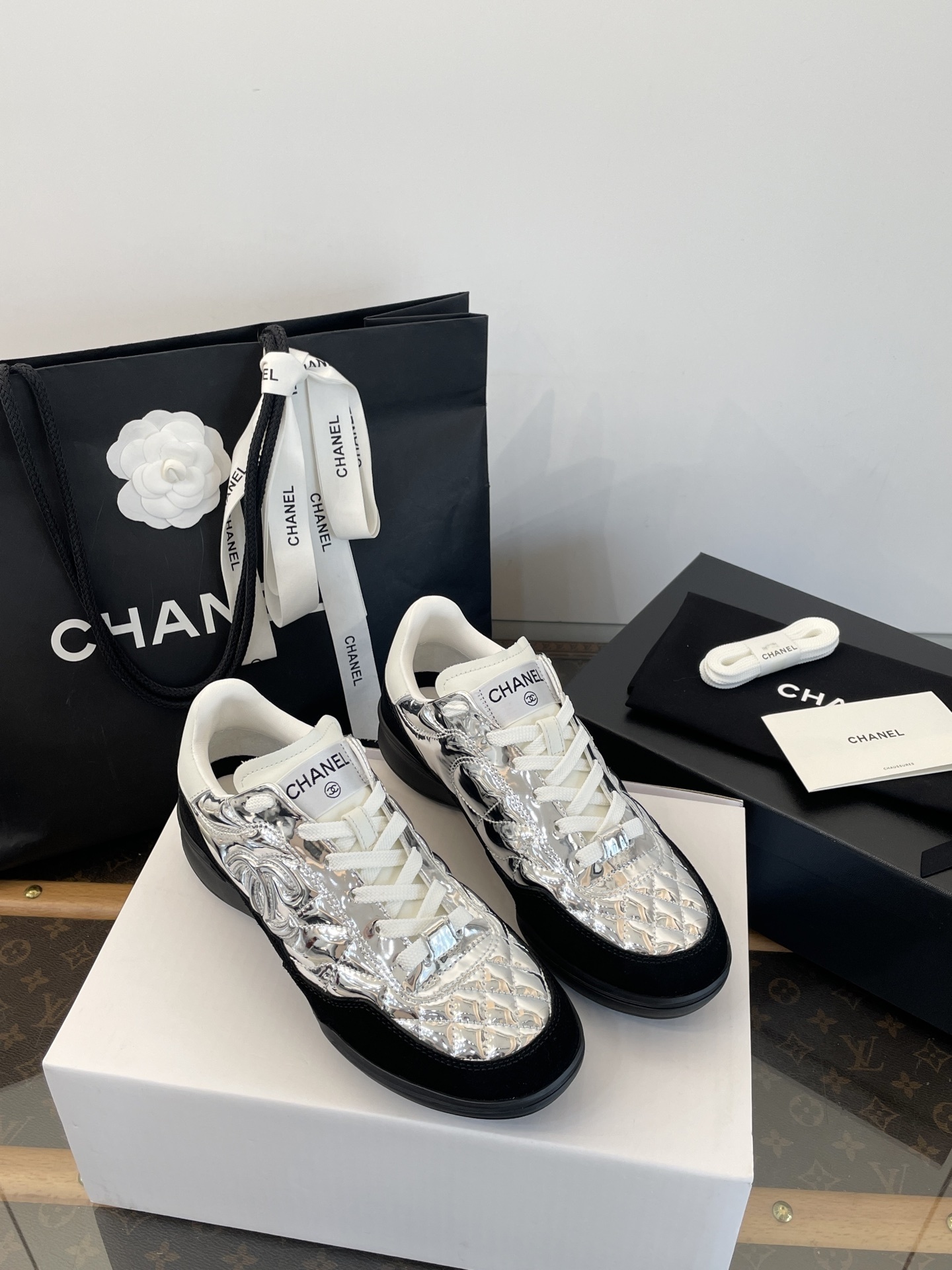 Chanel Quilted Metallic Silver & Black Sneakers Luxury Trainers