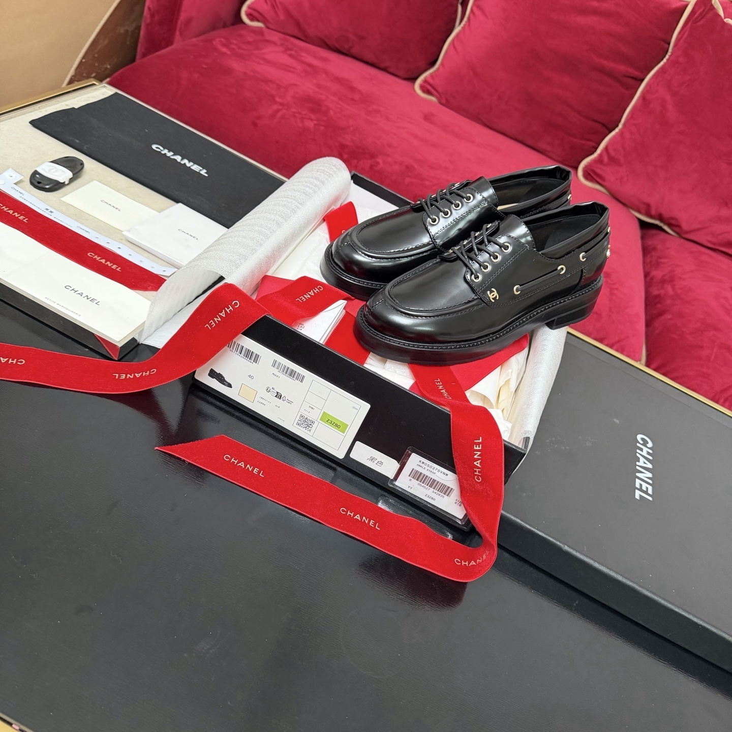 Chanel Black Leather Loafers with Gold CC Logo and Lace-up Detail