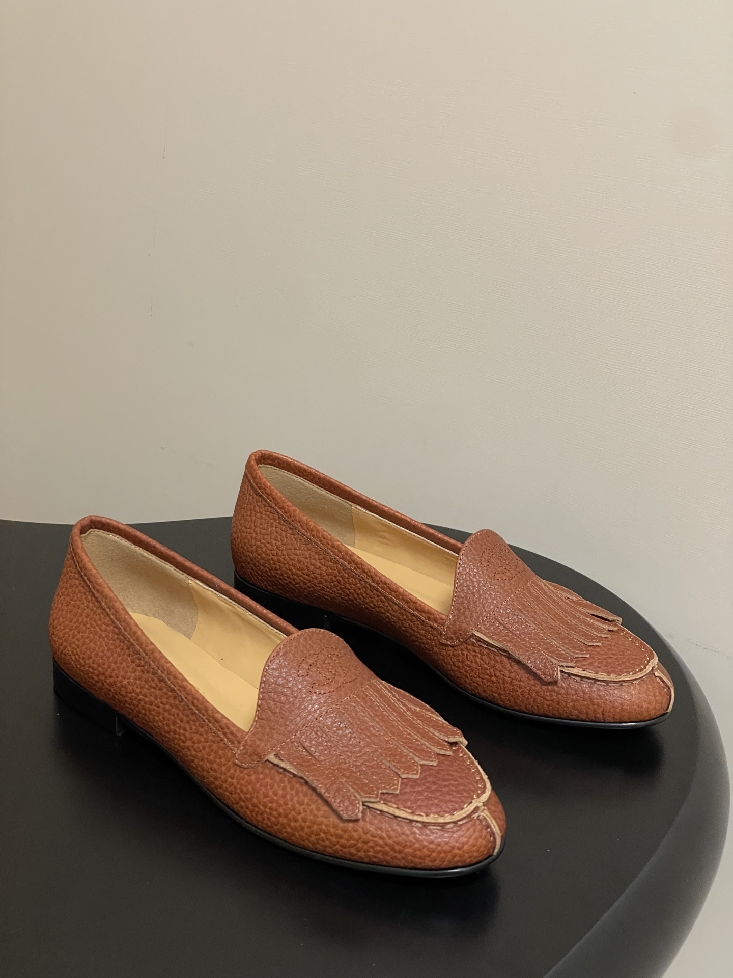 Chanel Brown Pebbled Leather Fringed Loafers with CC Logo