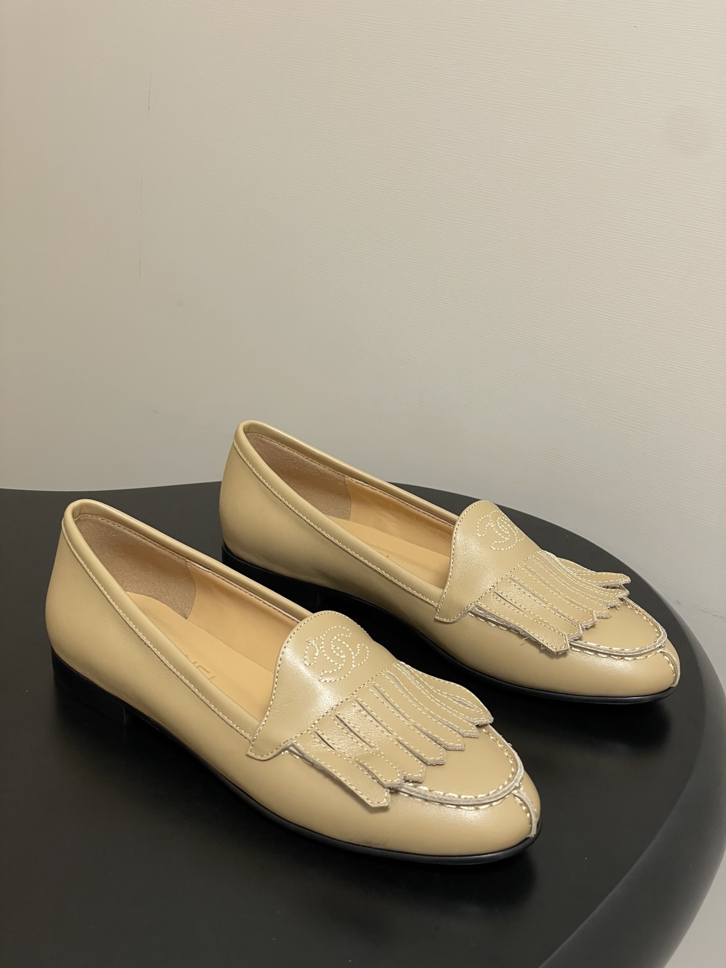 Chanel Beige Leather Fringe Loafers with CC Logo – Made in Italy