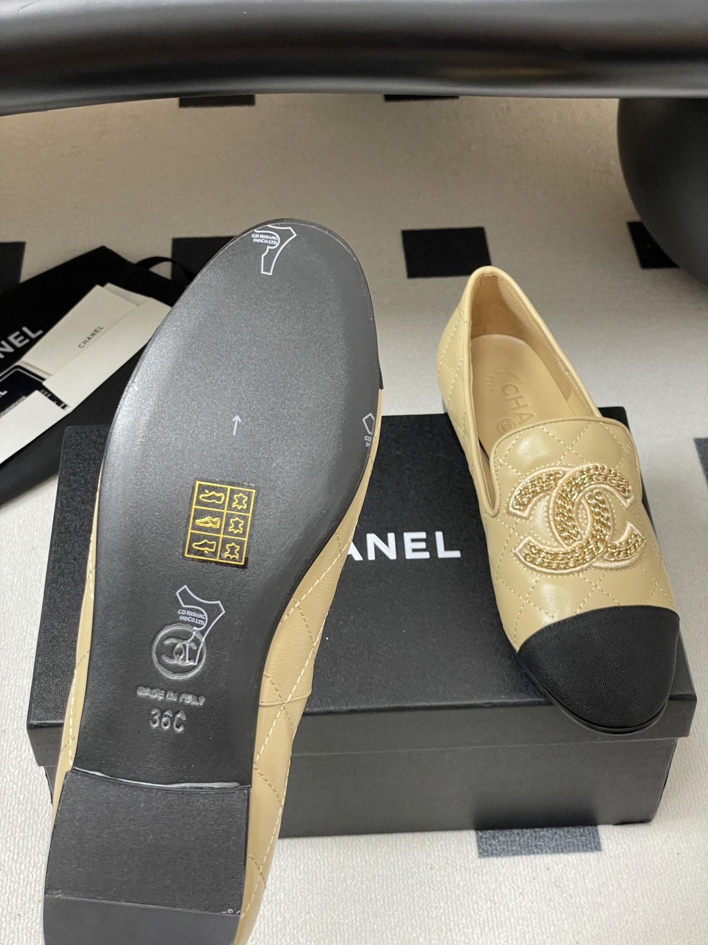 Chanel Quilted Leather Loafers with Black Cap Toe and Gold CC Logo