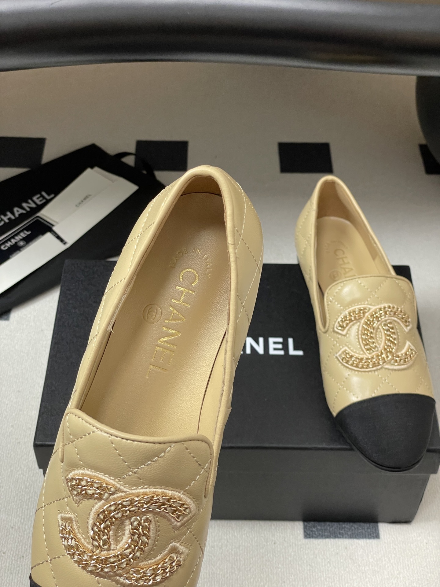 Chanel Quilted Leather Loafers with Black Cap Toe and Gold CC Logo