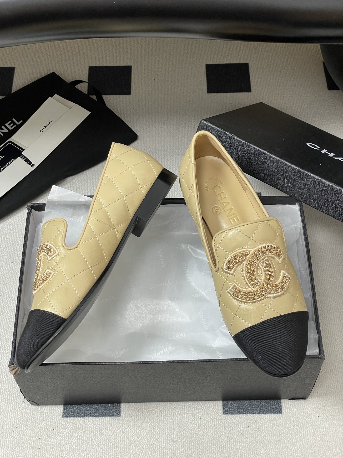 Chanel Quilted Leather Loafers with Black Cap Toe and Gold CC Logo