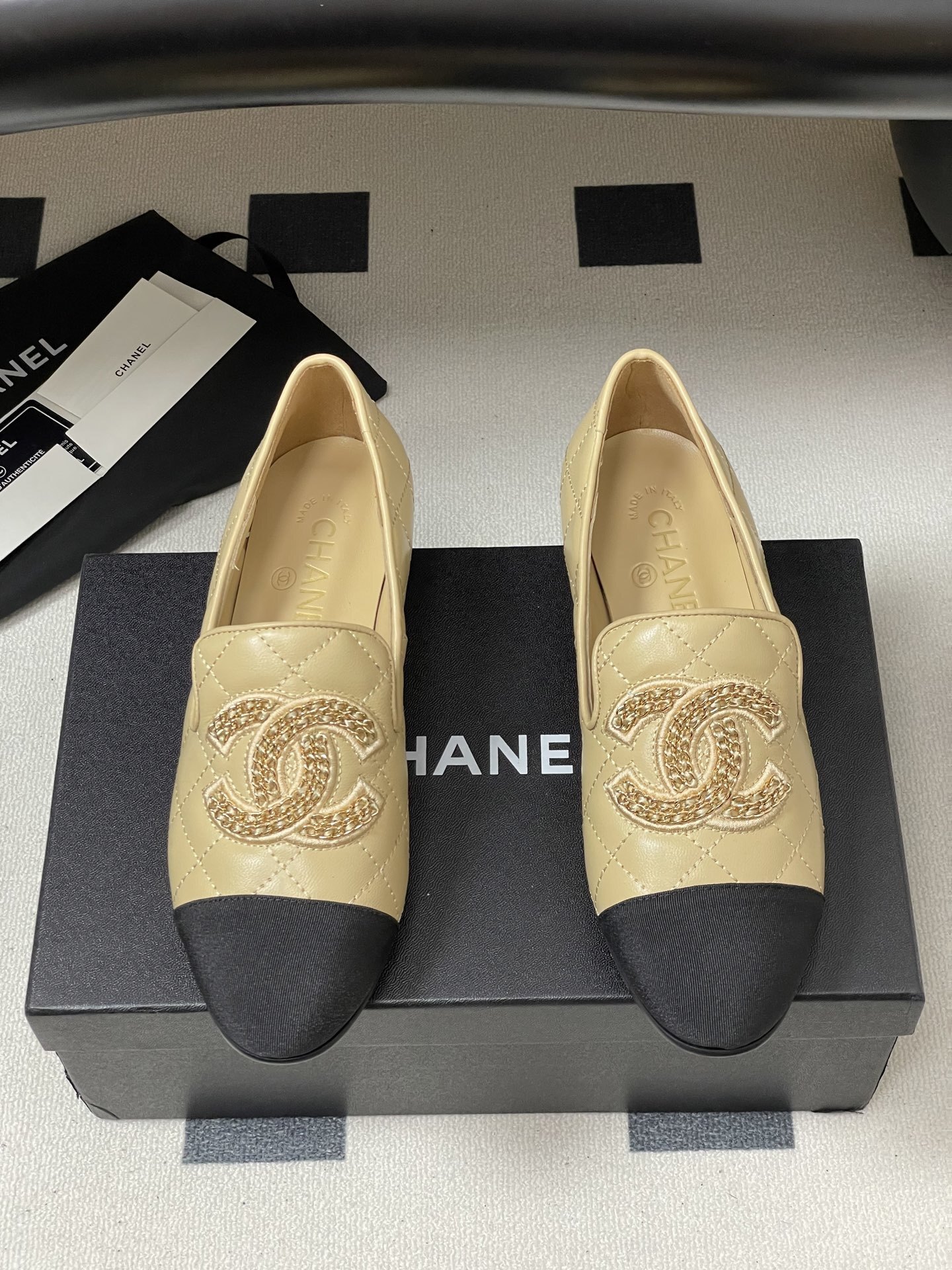 Chanel Quilted Leather Loafers with Black Cap Toe and Gold CC Logo