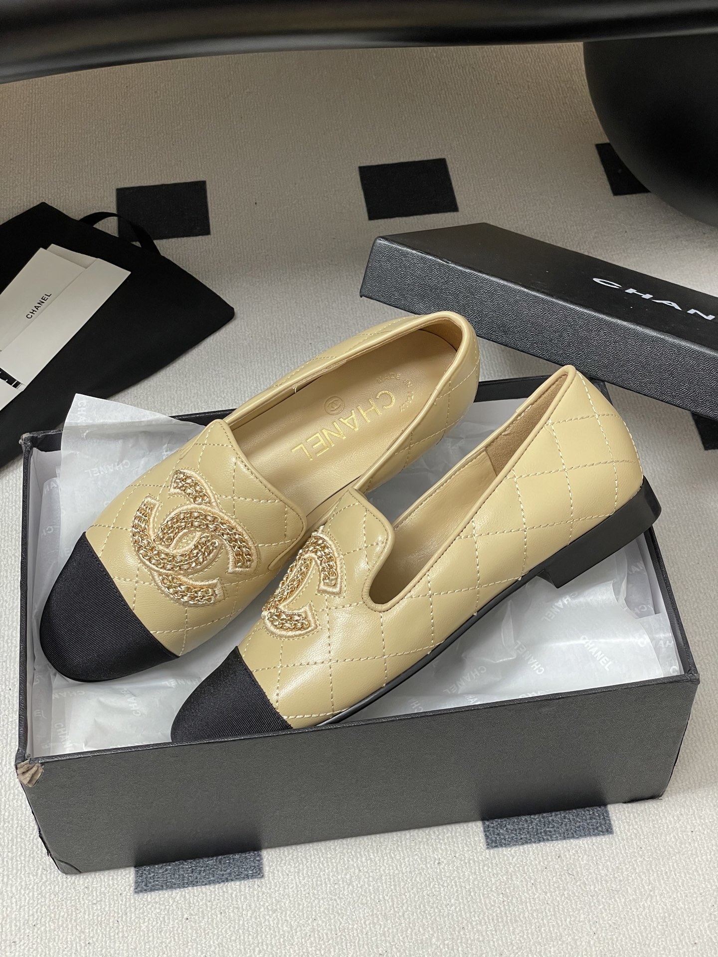 Chanel Quilted Leather Loafers with Black Cap Toe and Gold CC Logo