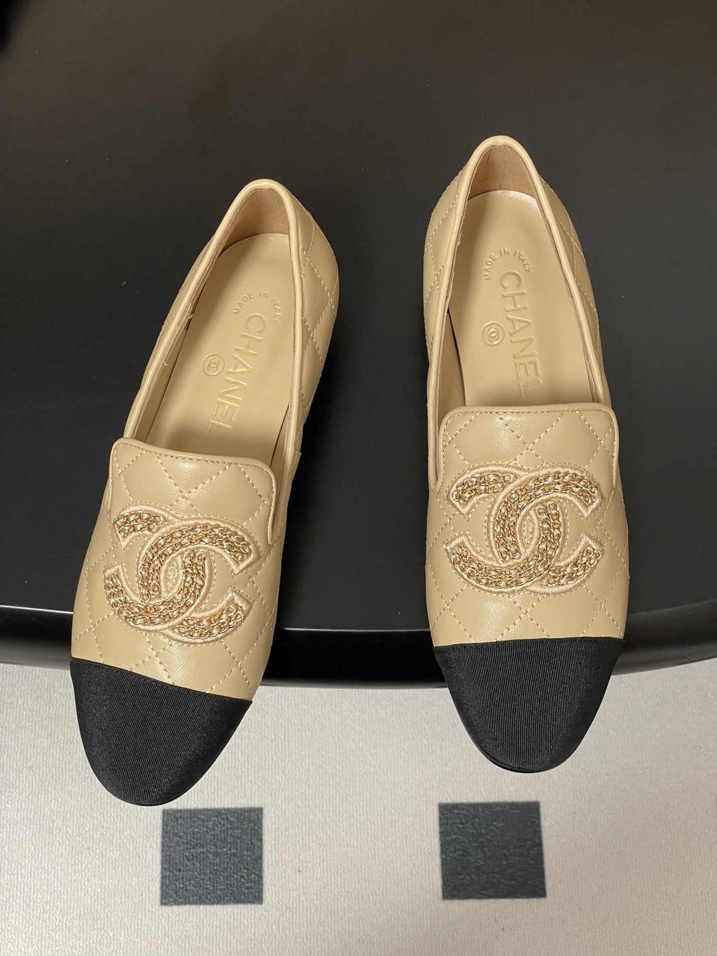 Chanel Quilted Leather Loafers with Black Cap Toe and Gold CC Logo