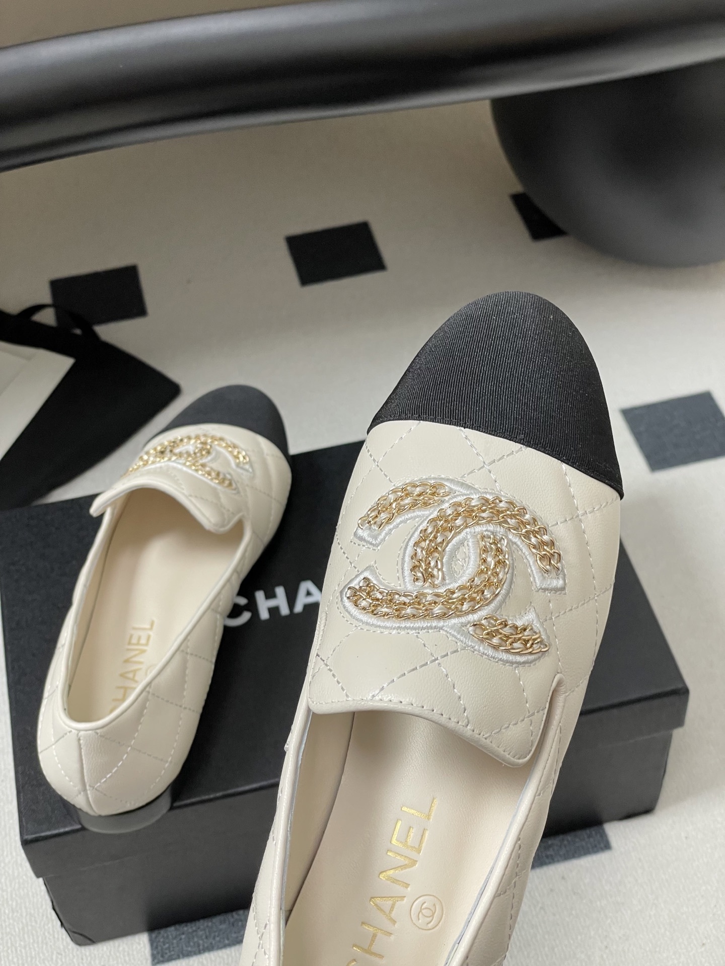 Chanel Two-Tone Quilted Leather Loafers - Elegant CC Chain Flats