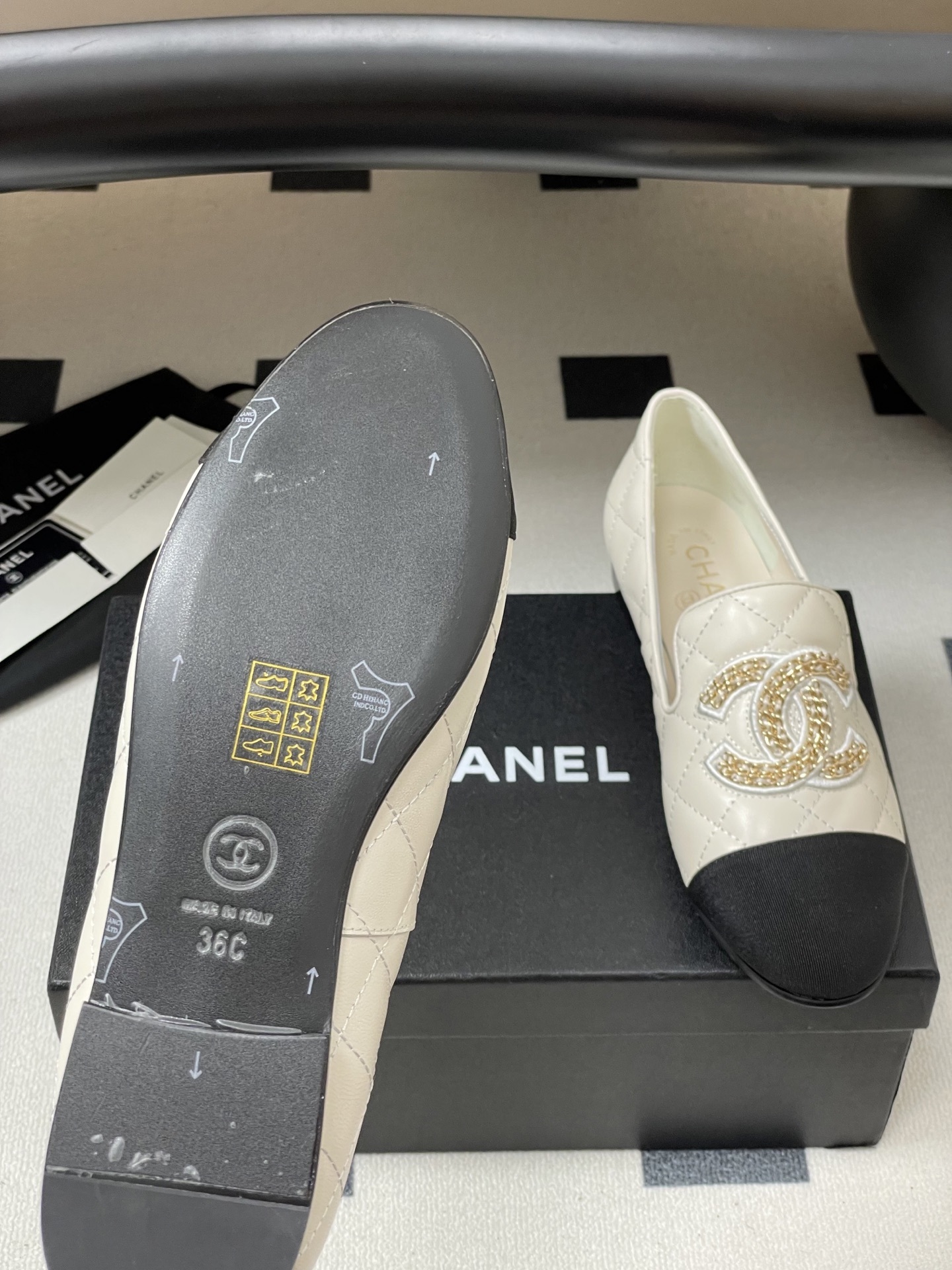 Chanel Two-Tone Quilted Leather Loafers - Elegant CC Chain Flats