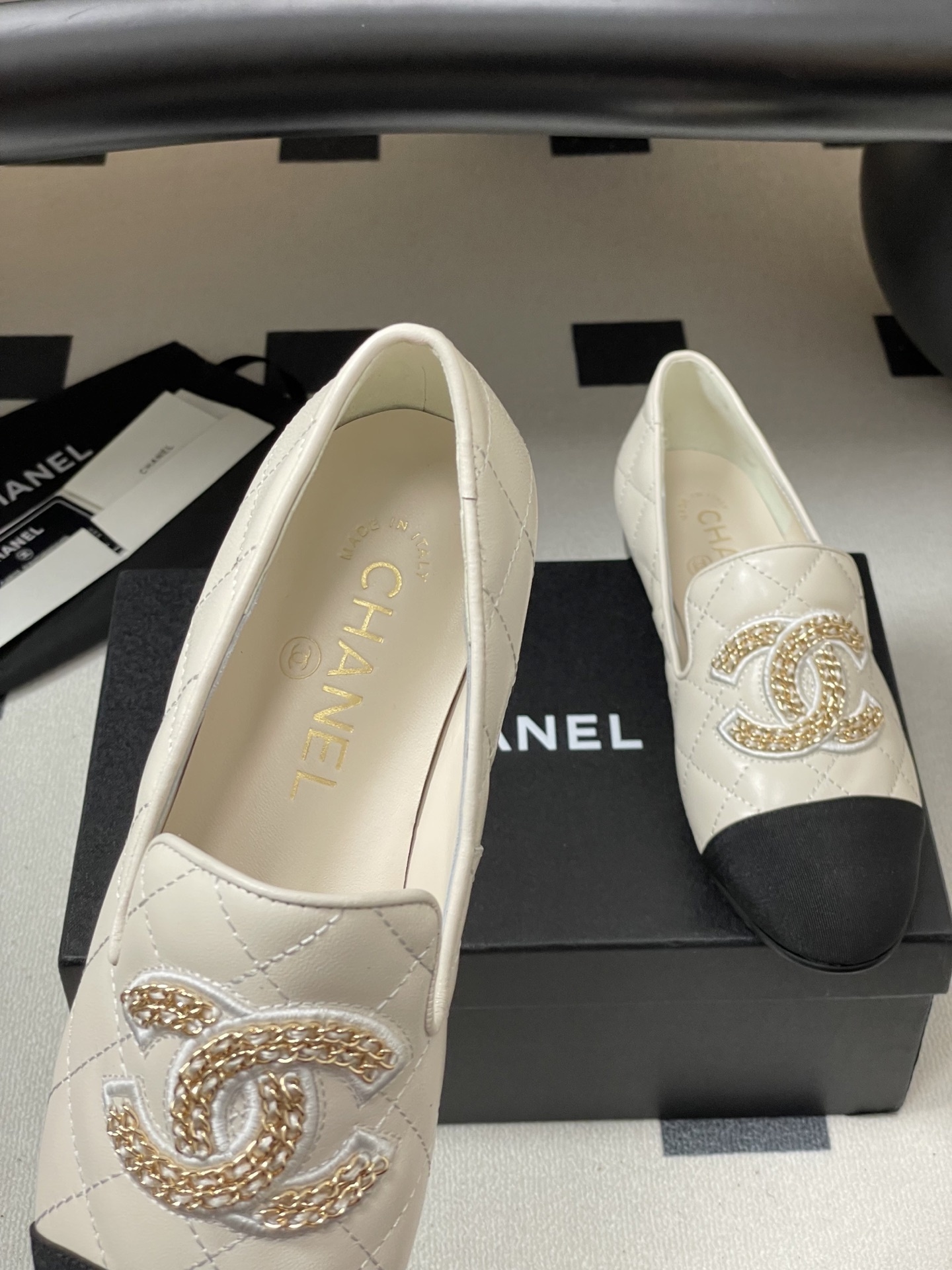 Chanel Two-Tone Quilted Leather Loafers - Elegant CC Chain Flats