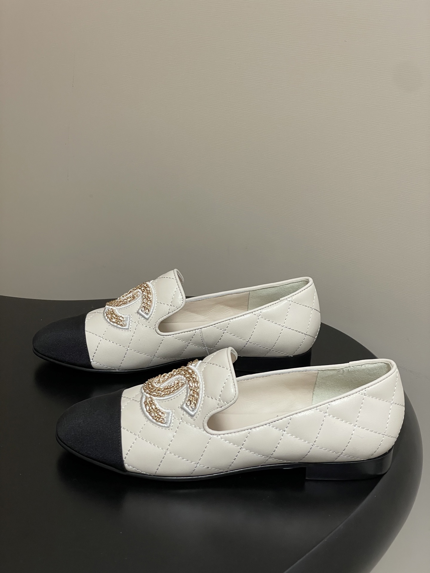 Chanel Two-Tone Quilted Leather Loafers - Elegant CC Chain Flats