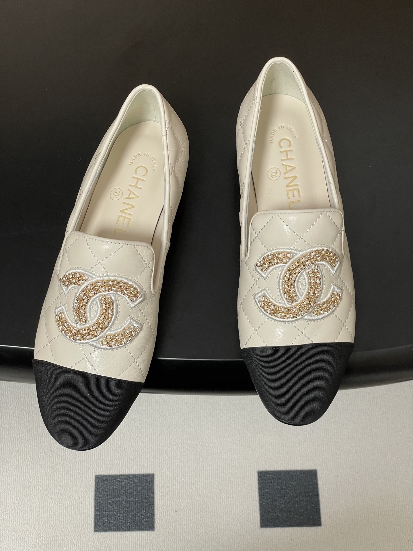 Chanel Two-Tone Quilted Leather Loafers - Elegant CC Chain Flats